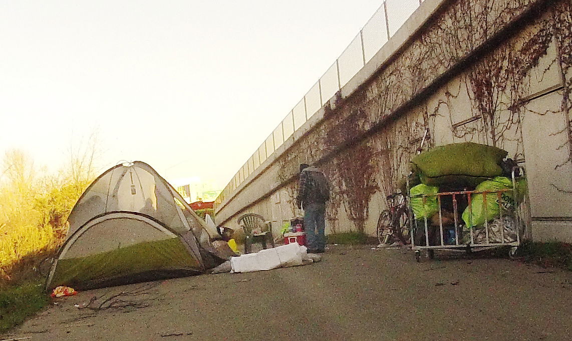 Homeless camps along the Guadalupe River and underneath Highway…