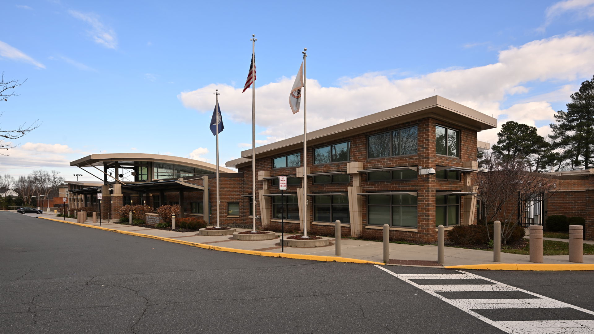 The corner of the McLean Government Center building, with three…