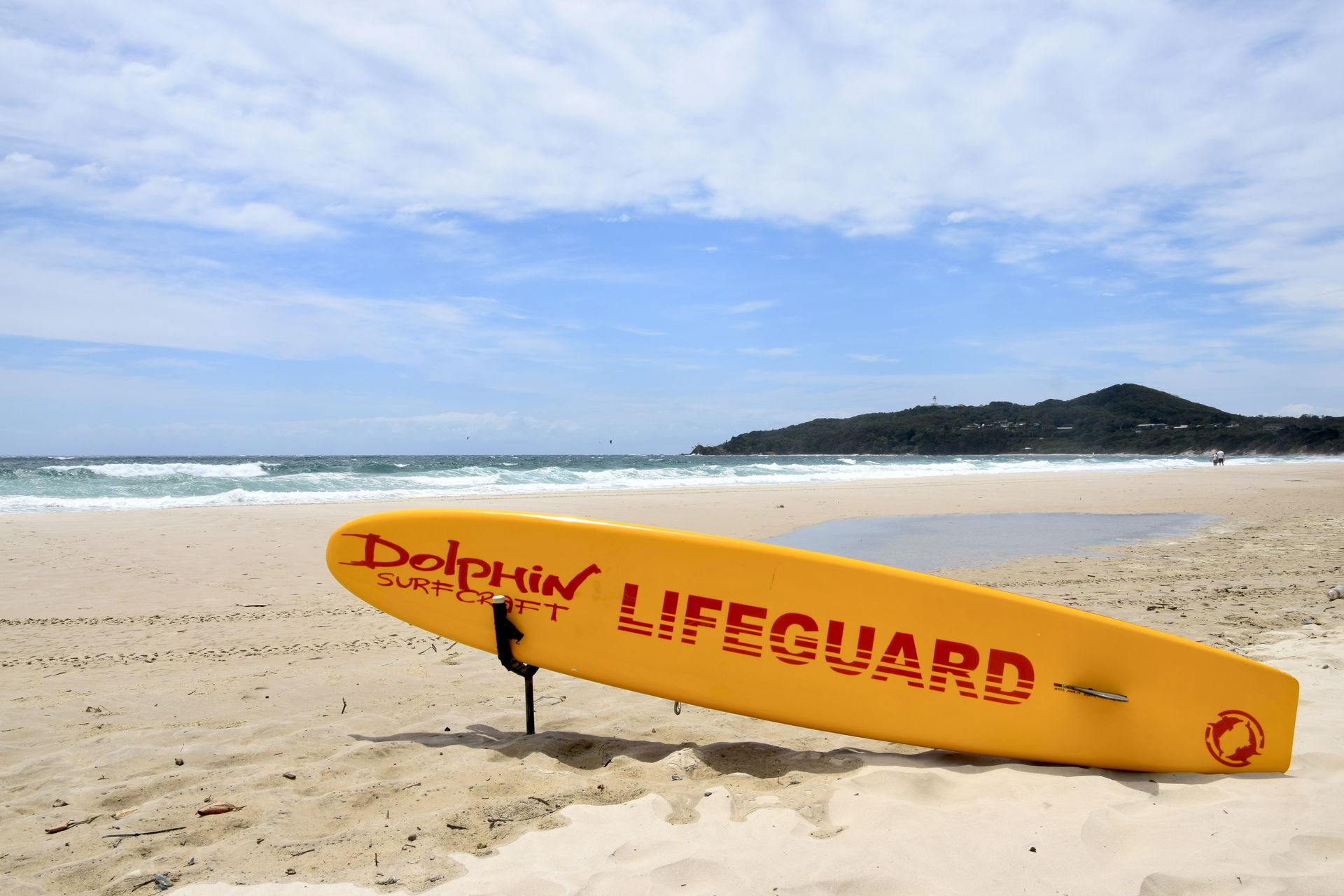 Main Beach in Byron Bay with Cape Byron in the background in th…
