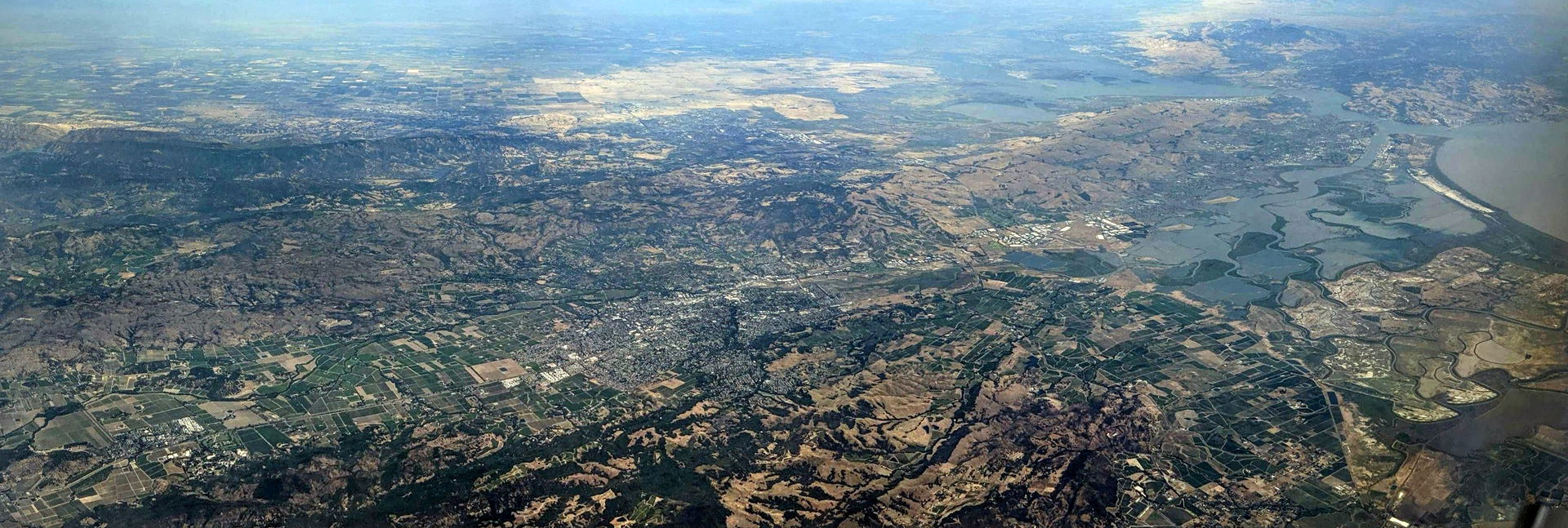 Aerial panoramic view of the lower Napa Valley, from Yountville…