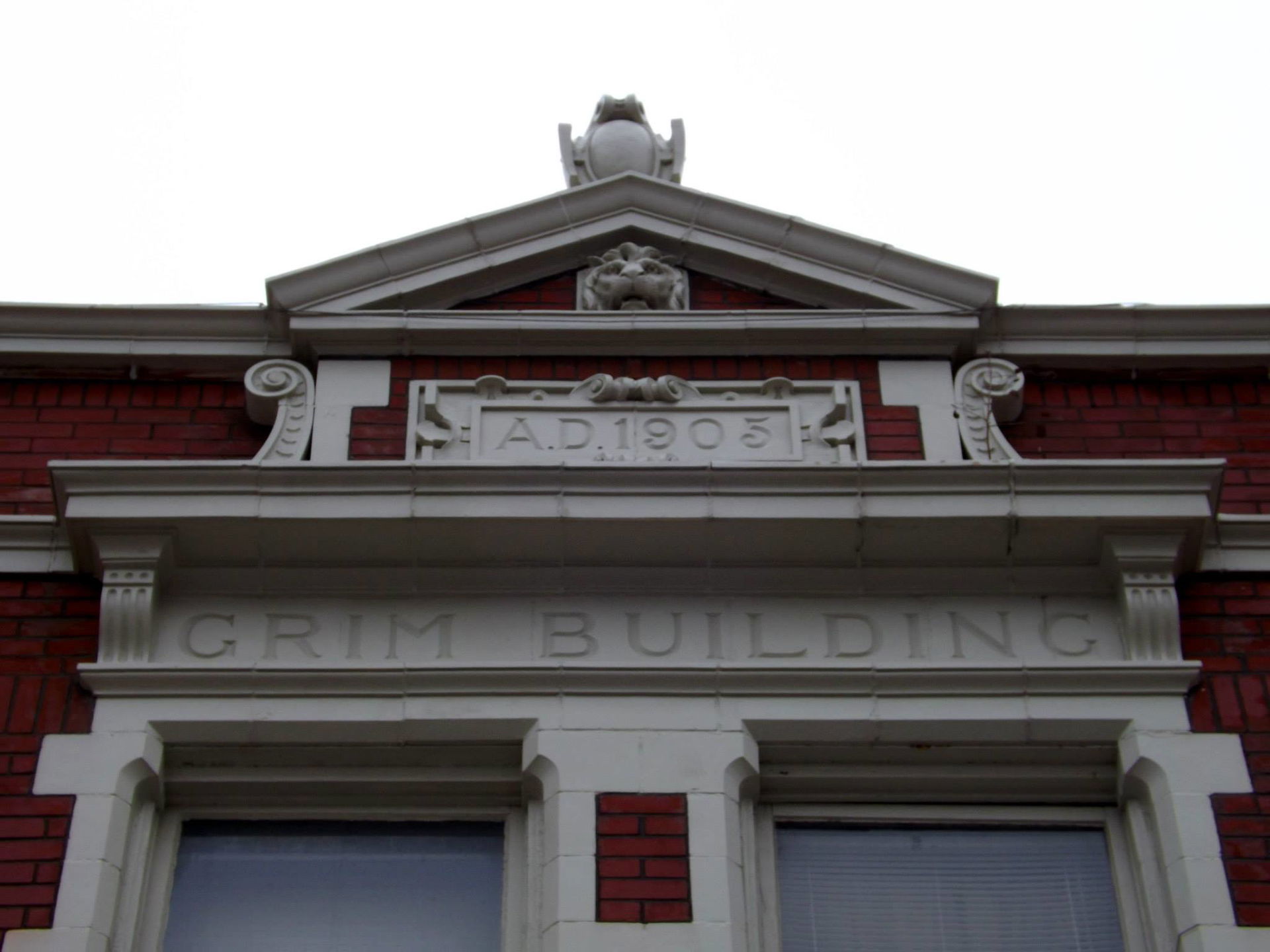 Ornamentation above the doorway of the Grim Building in Kirksvi…