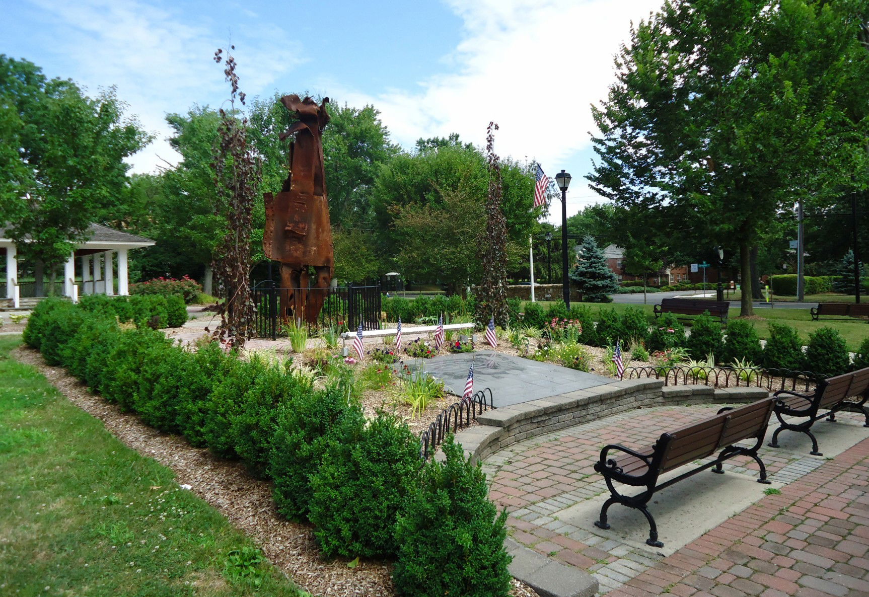 Memorial park with benches, art, pergola. New Providence, New J…