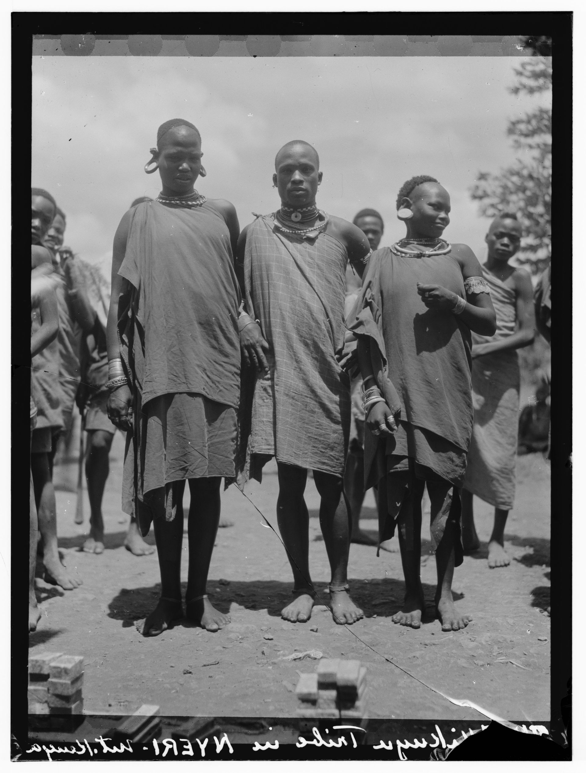 Title: Kenya Colony. Karatina. Wakikuyu types. Men and women
Ab…