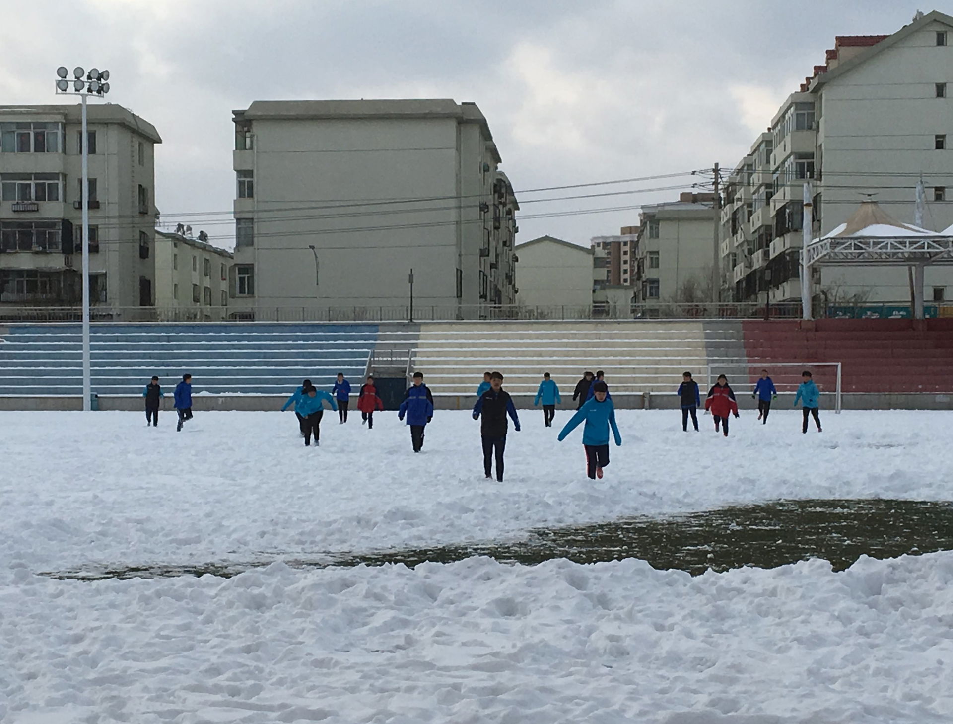 Students at Baotou Foreign Languages School playing soccer in t…