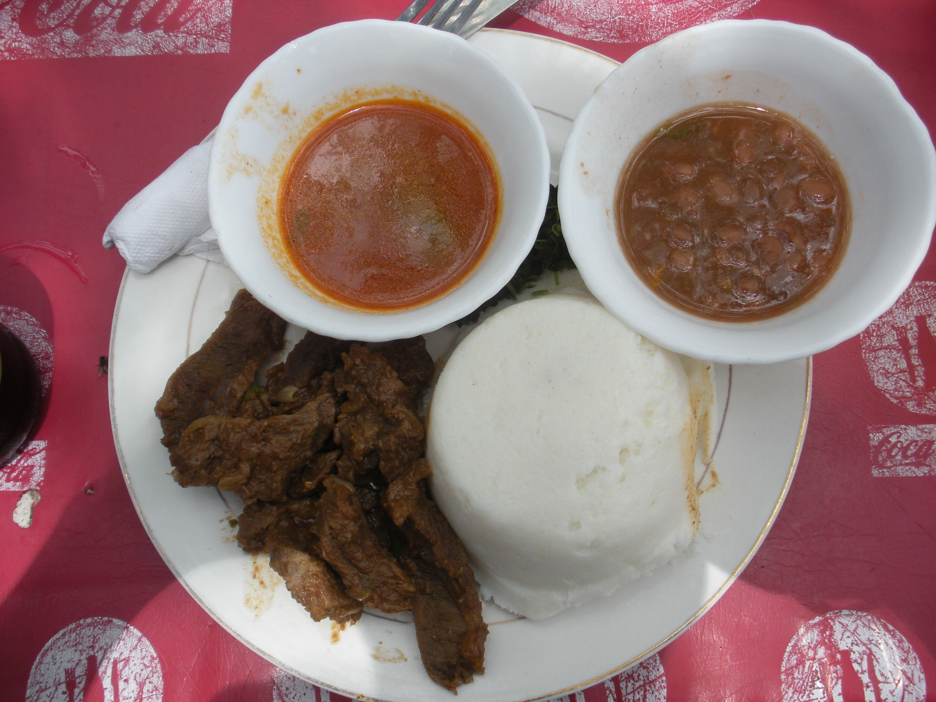 Ugali with beef and sauce, This photo has been taken by Mr.Chen…