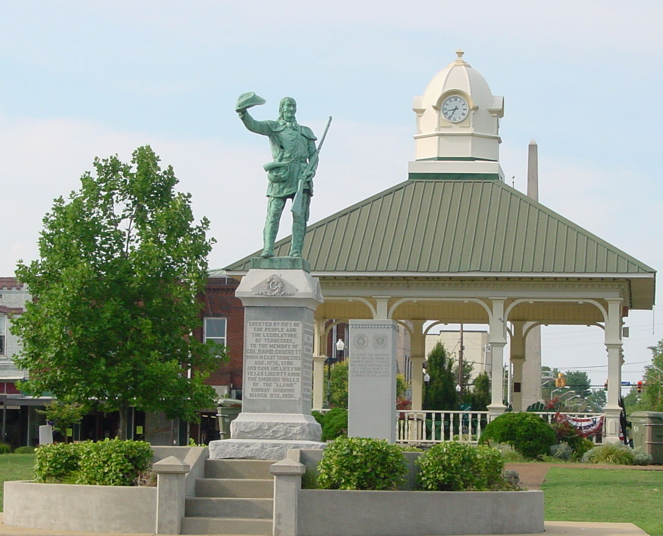 This photograph is of the town square in Lawrenceburg, TN with …