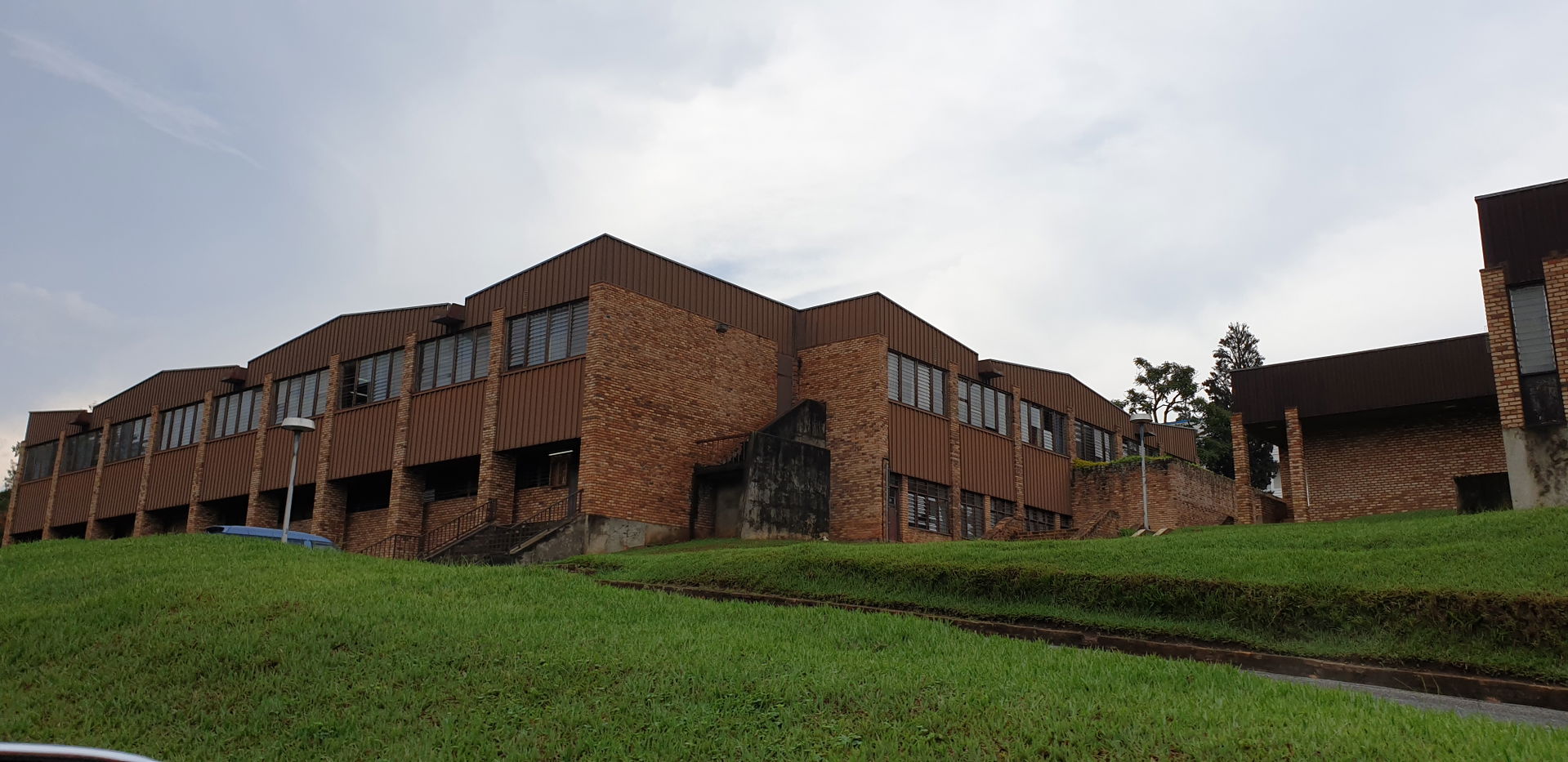 The campus is located in Huye city. The architecture of many bu…