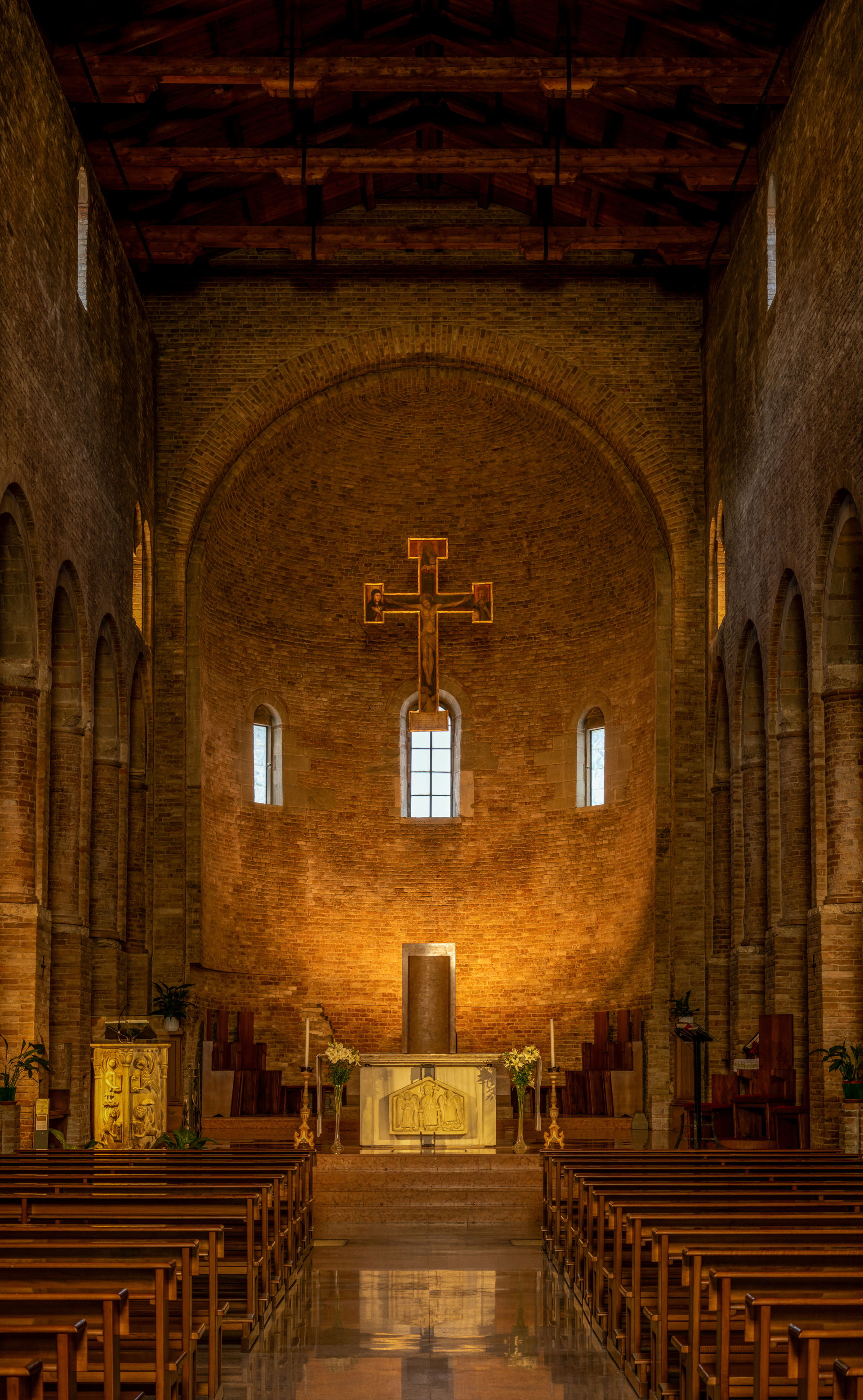 The interior of the Basilica of Sarsina is solemn yet frugal an…