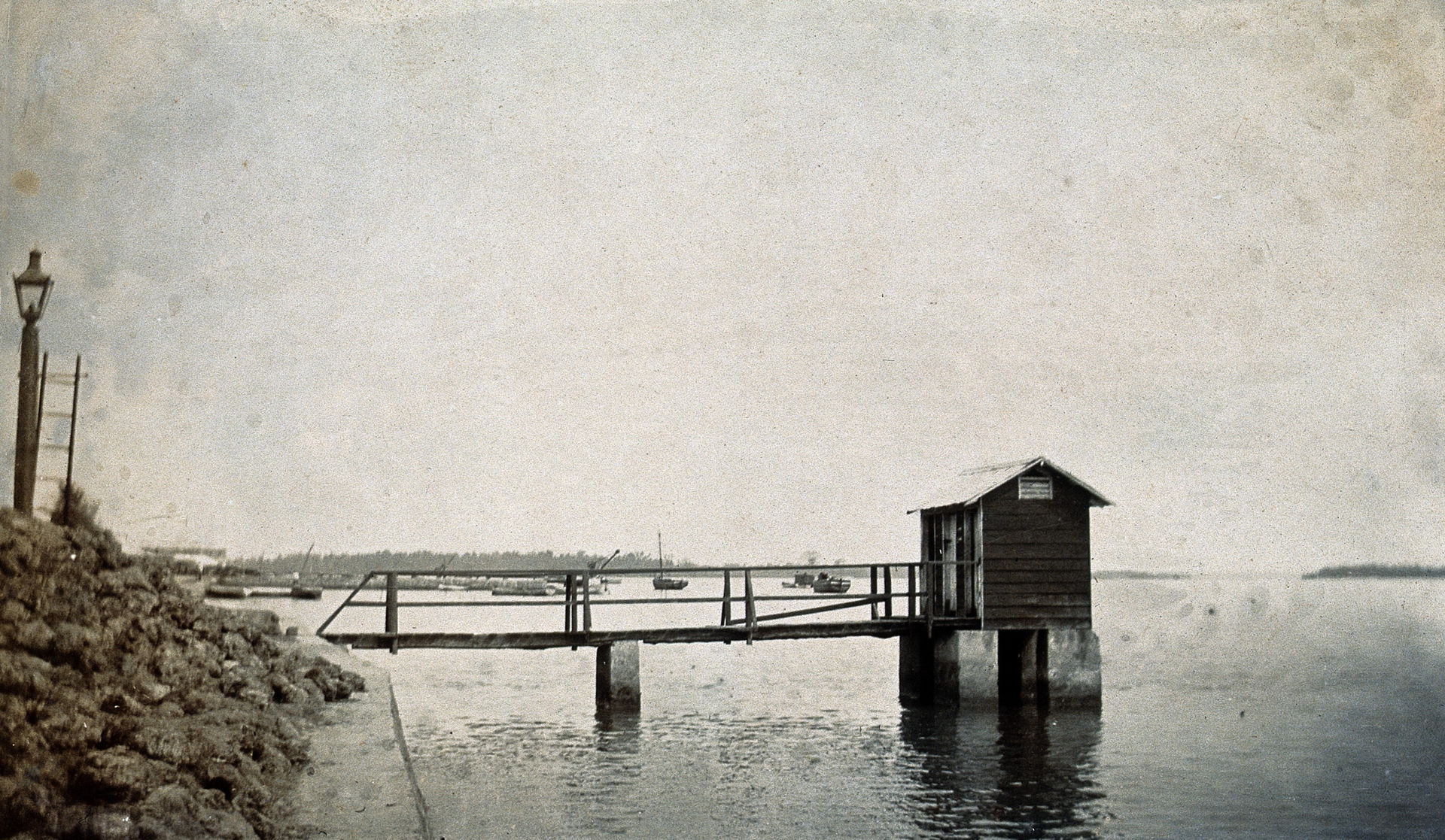 Wooden building on a river; to be used as a public toilet in Bo…