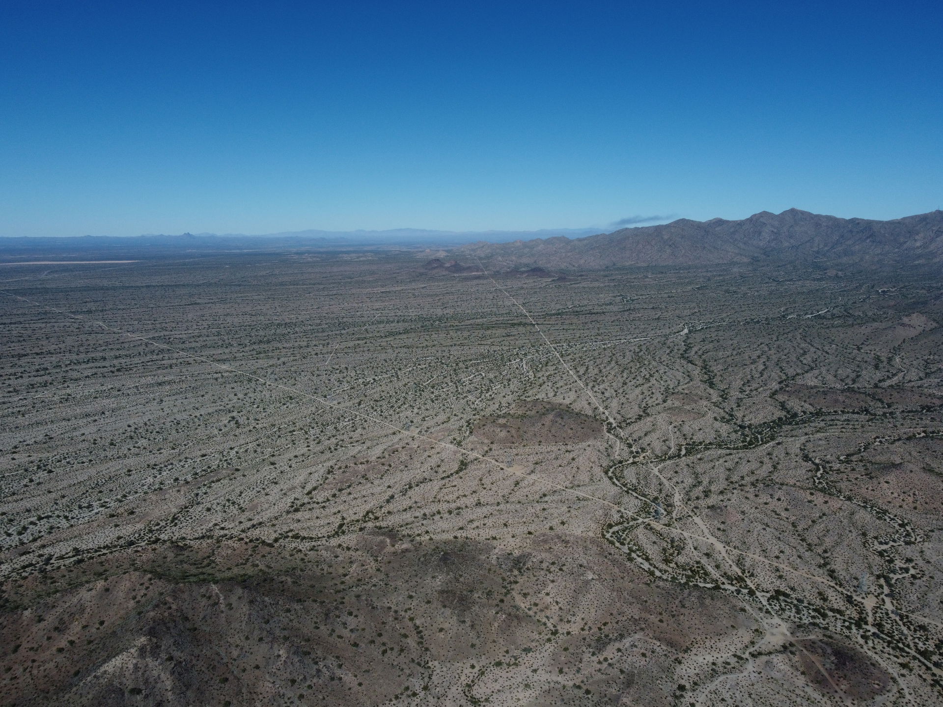 Photo of the land, hills, and brush of Buckeye, Arizona, USA