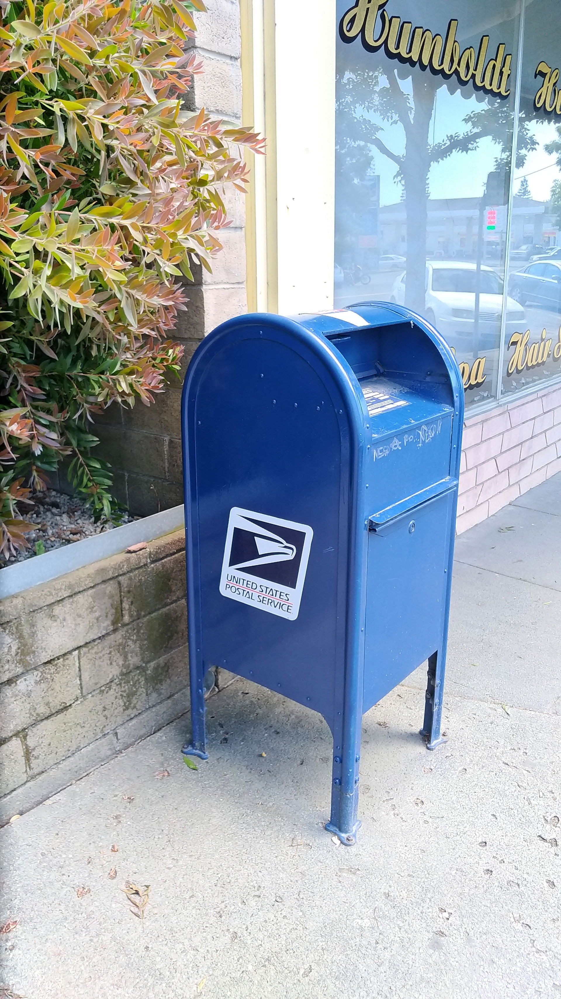 A blue United States Postal Service mailbox in Garberville, Cal…