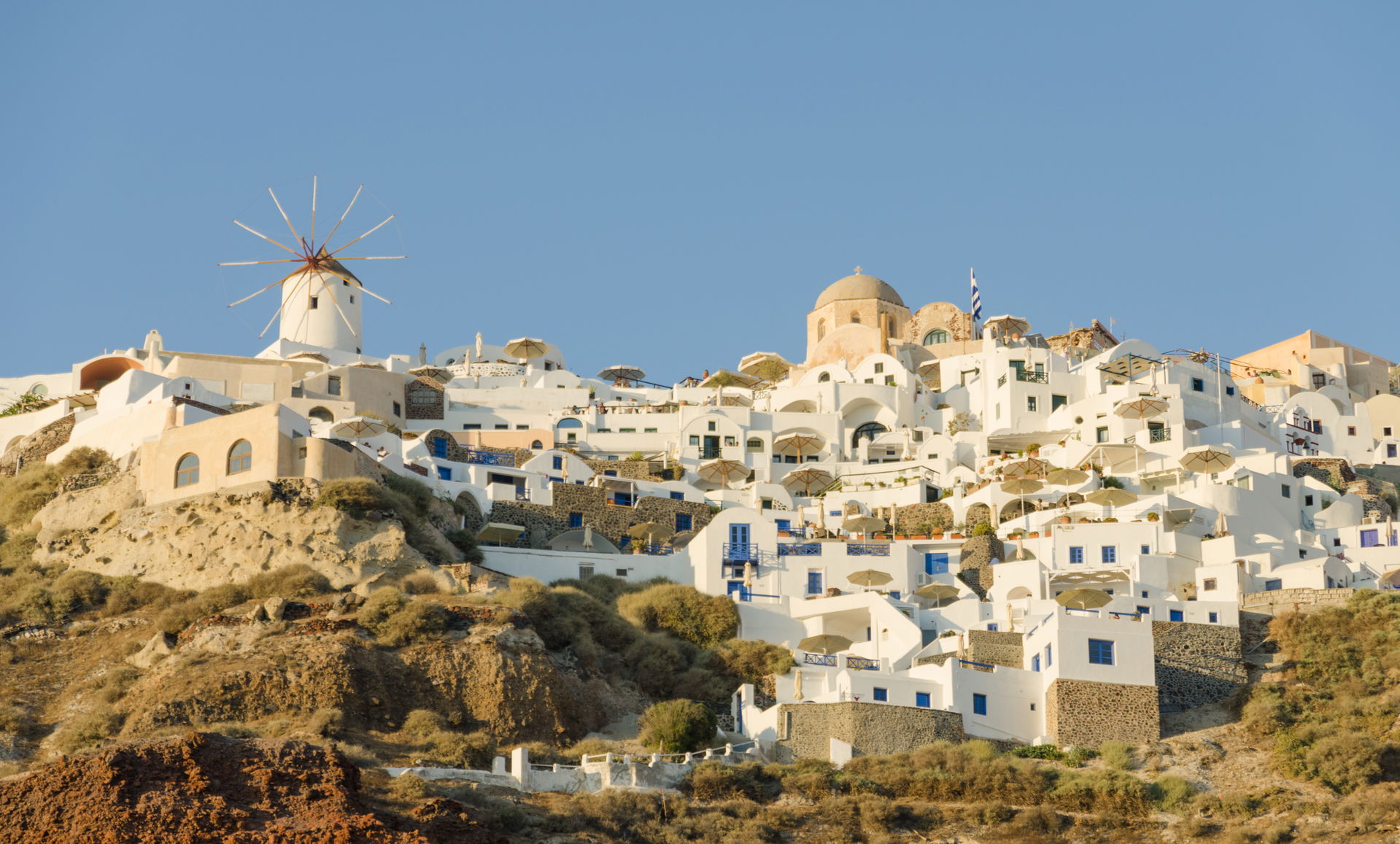 Oia seen from a boat in the caldera, Santorini, Greece.