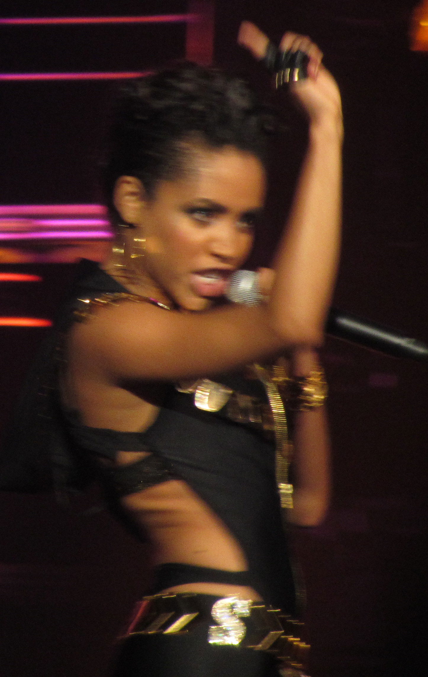 Sabi during performance on Femme Fatale Tour in 2011.