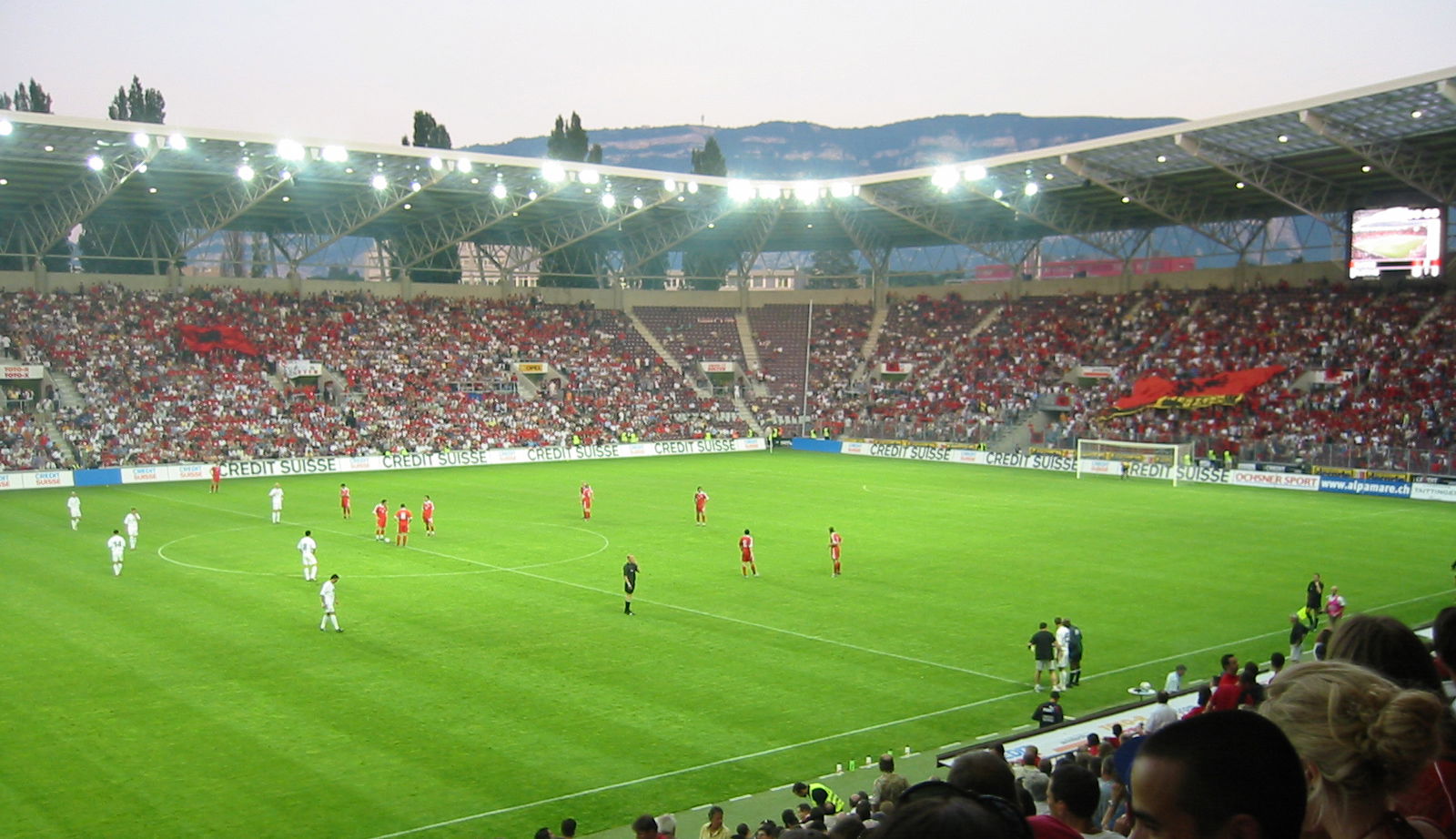 Albanian (white shirts) and Swiss (red) national soccer teams a…