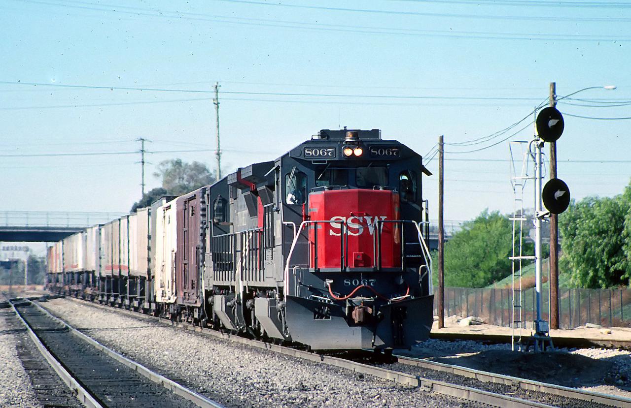 A short train through Colton Junction, Colton CA. January 1989.…