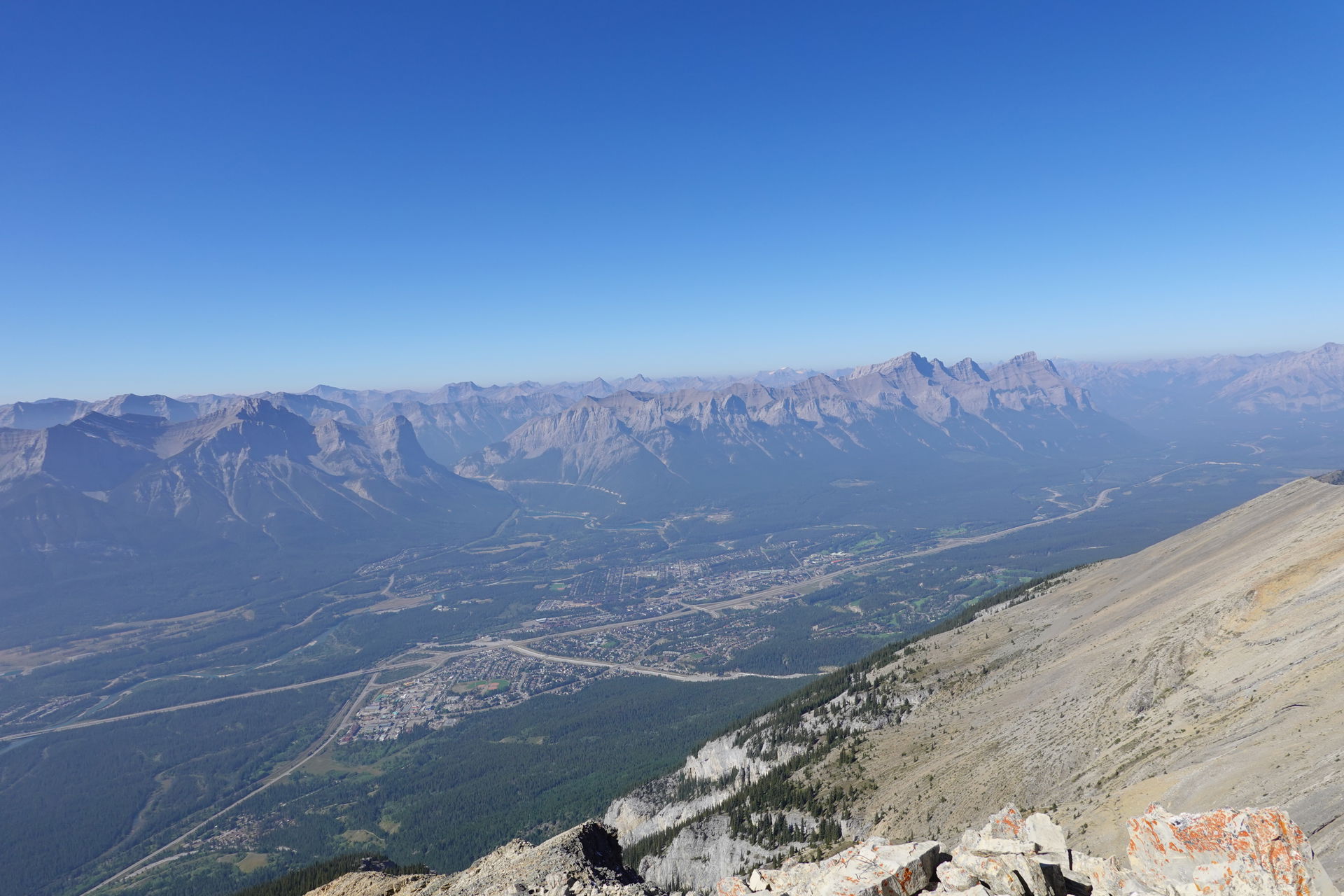 Canmore seen from Grotto Mountain in smoky day