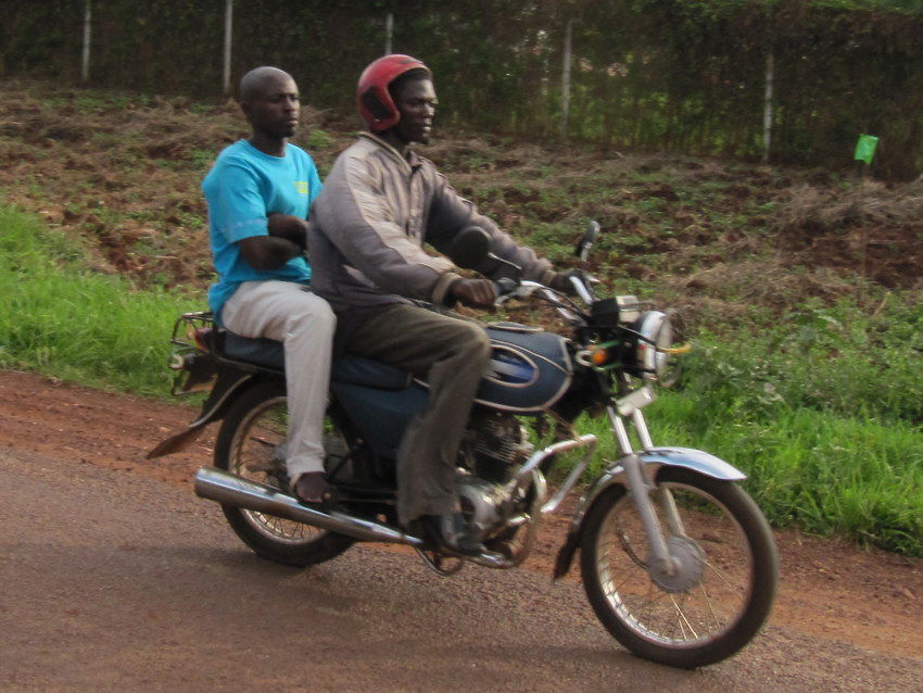 en:Boda-boda. Uganda, somewhere on A109 Road, between en:Jinja …