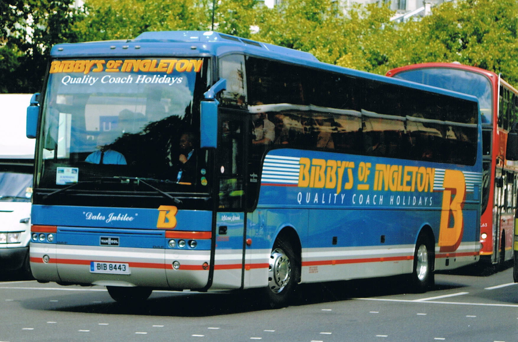 Seen in Park Lane, London is BIB 8443. DAF Van Hool.