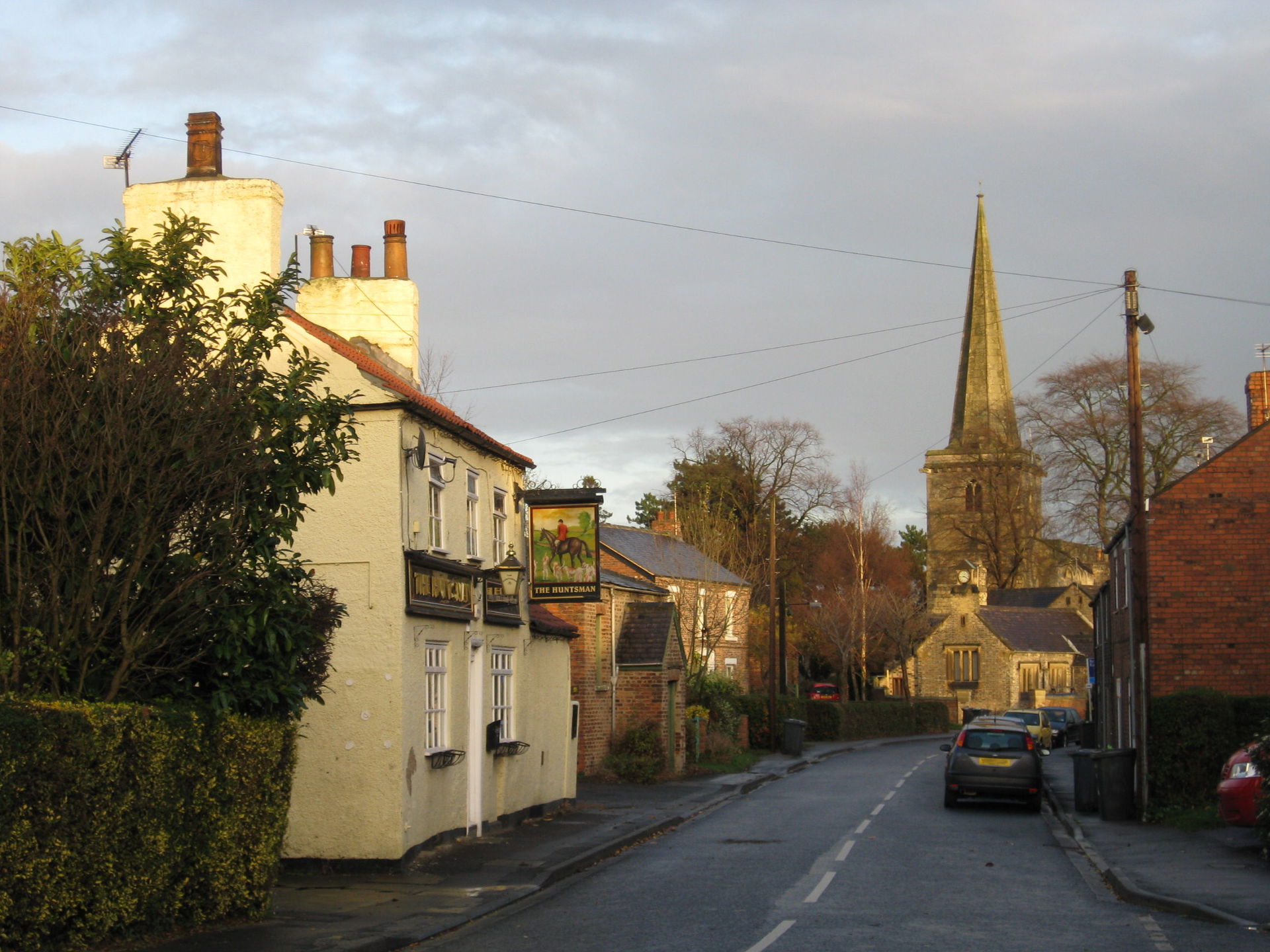 View east along Main Road, Drax village, North Yorkshire. On th…