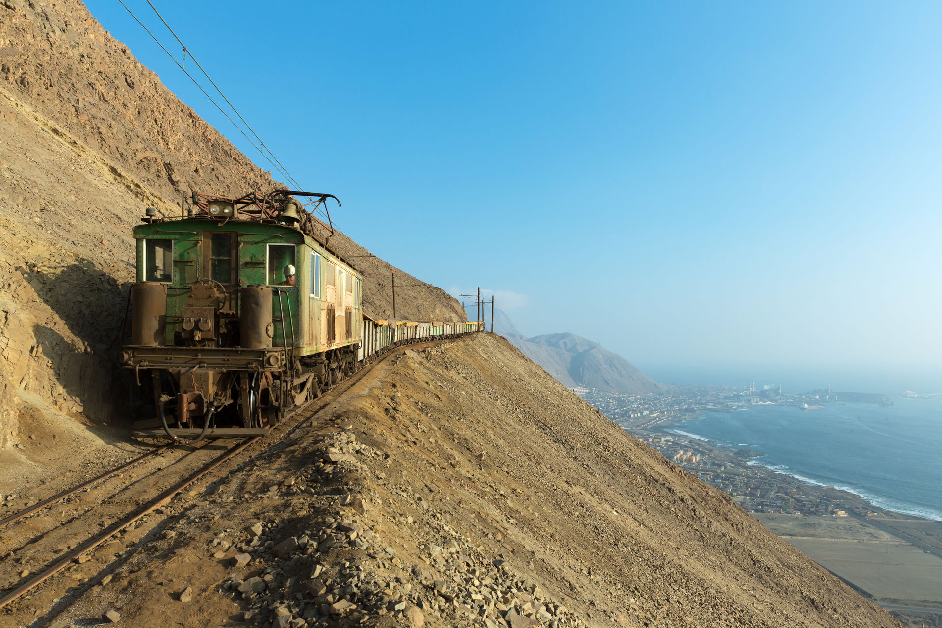 High above Tocopilla, Chile, one of SQMs Boxcabs coasts downhil…