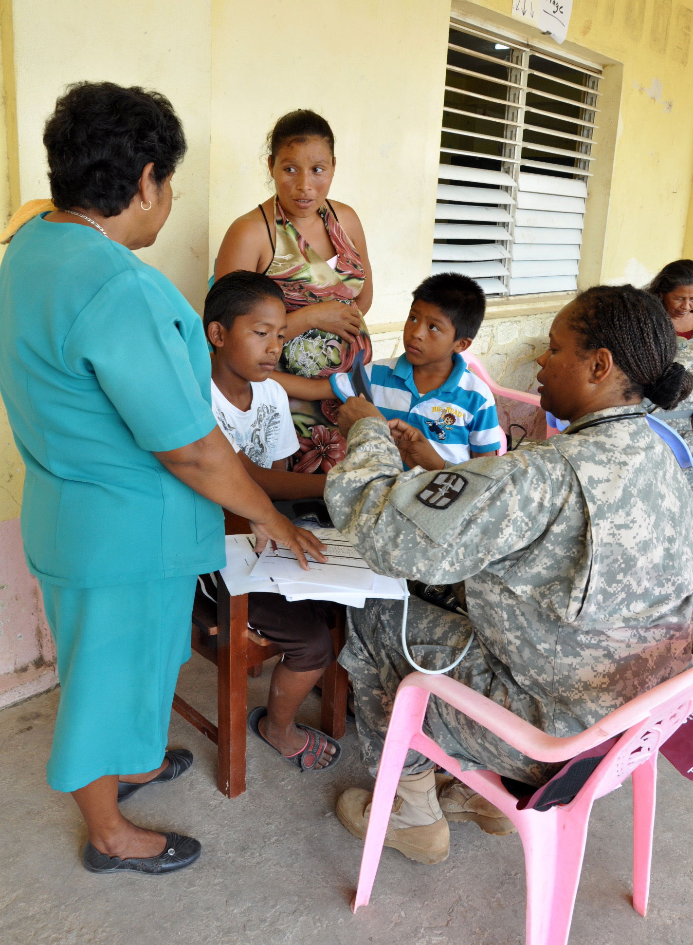 Enela Martinez, left, a Chunox health care worker, and U.S. Arm…