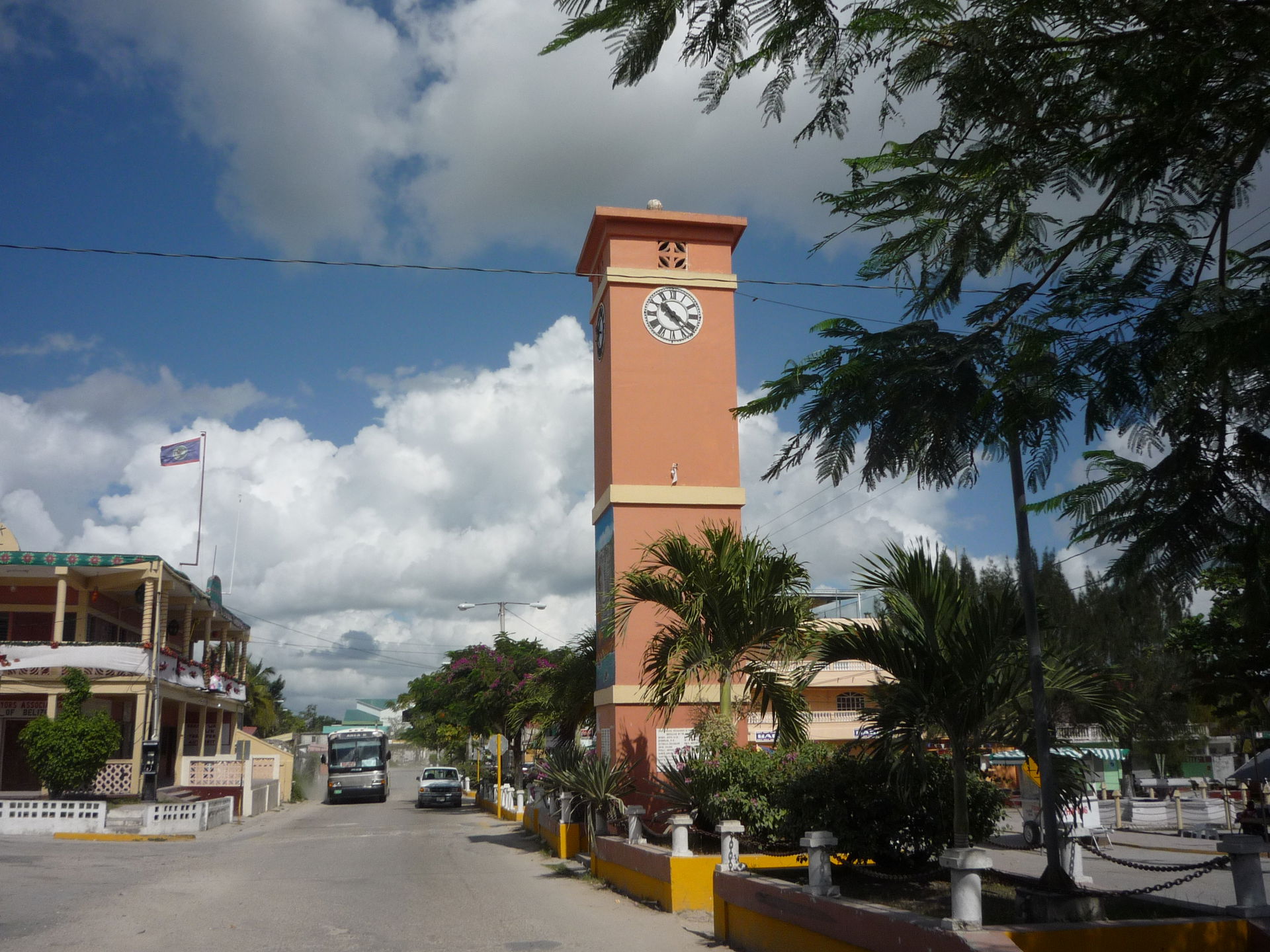Street, park, and clock tower in Orange Walk Town, Belize.