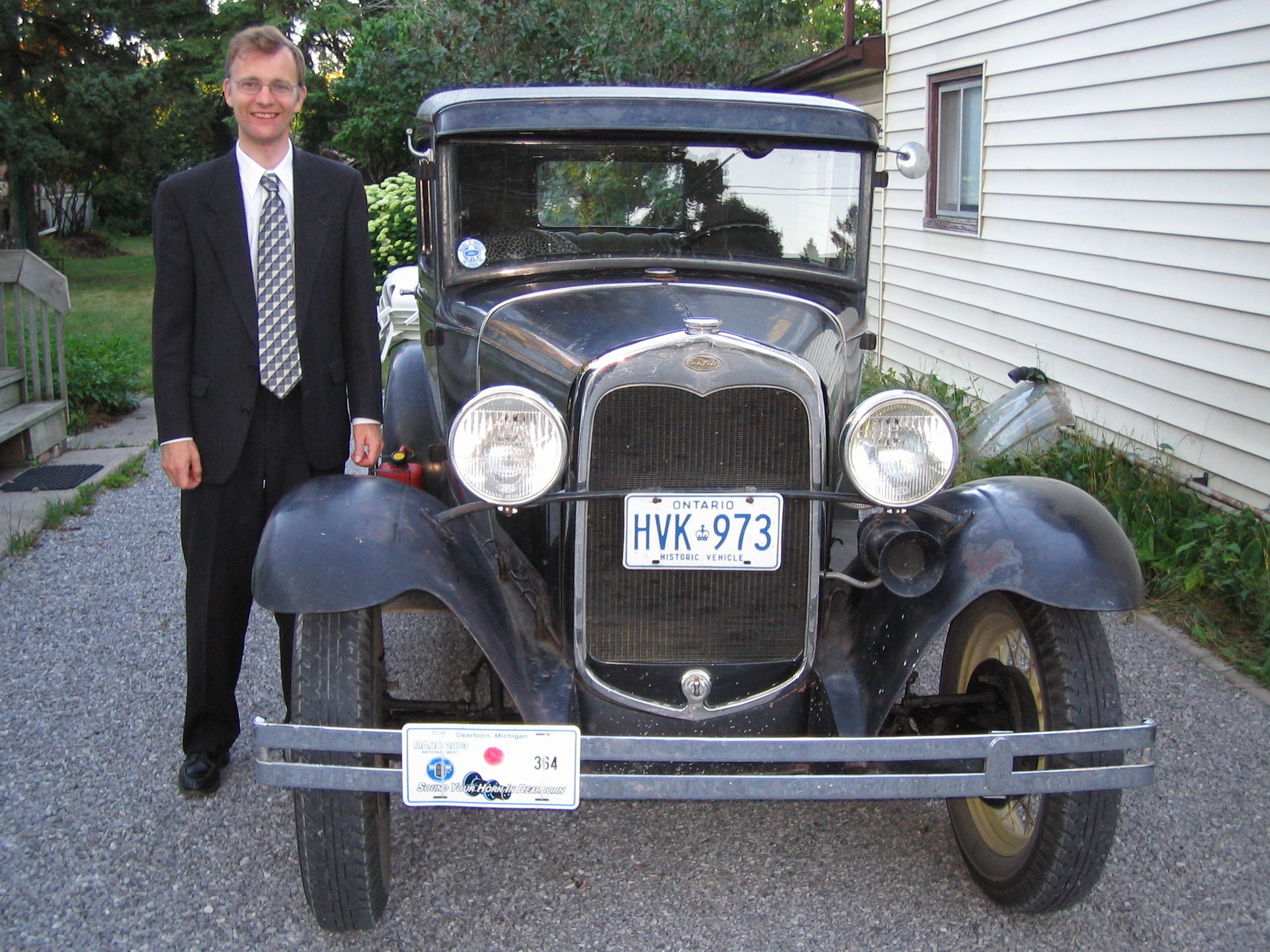 Robert T Bell with Allan Fehrenbach's Model A Ford