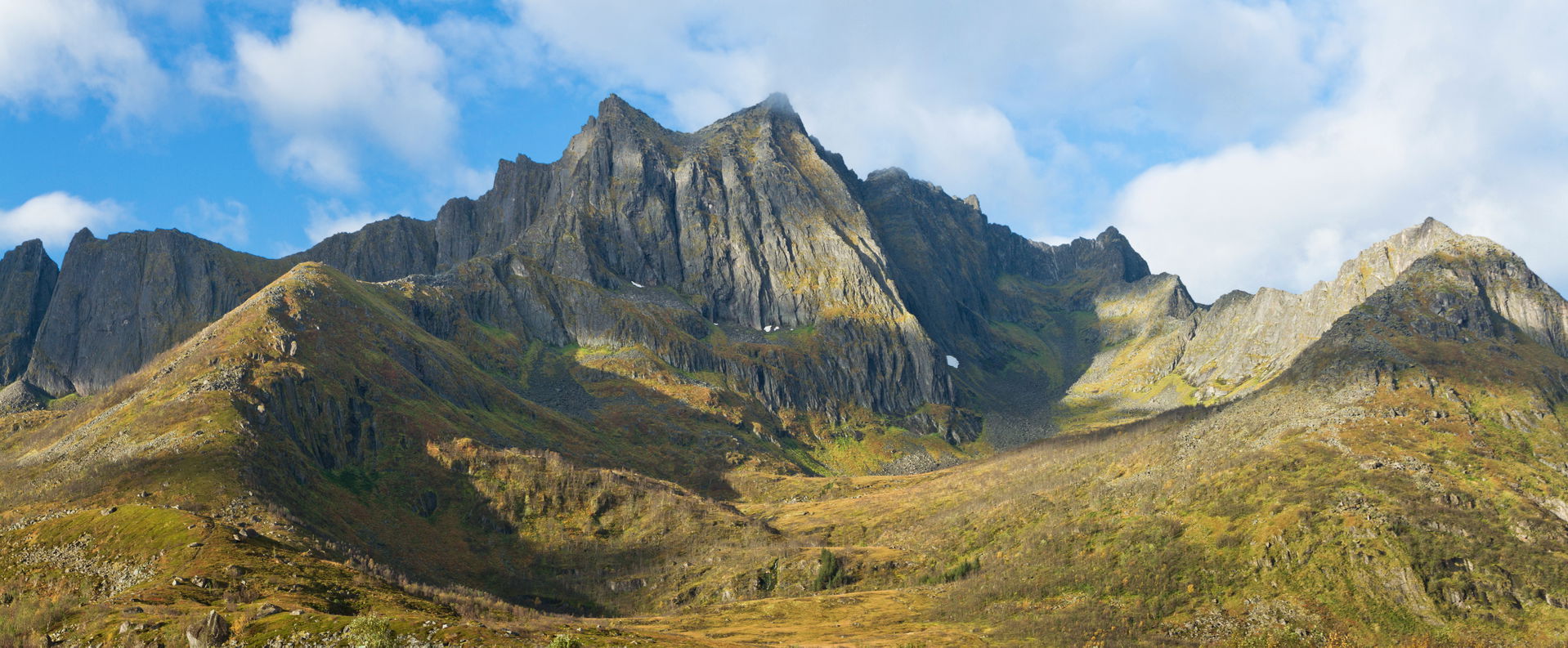 The northeast face of Fjølhaugen mountain in Berg, Senja, Troms…