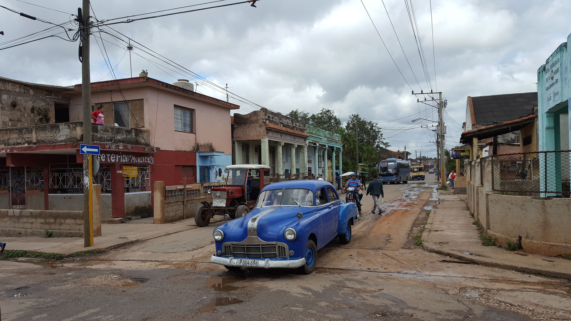 An old Mercedes car in the street of central Artemisa, Cuba