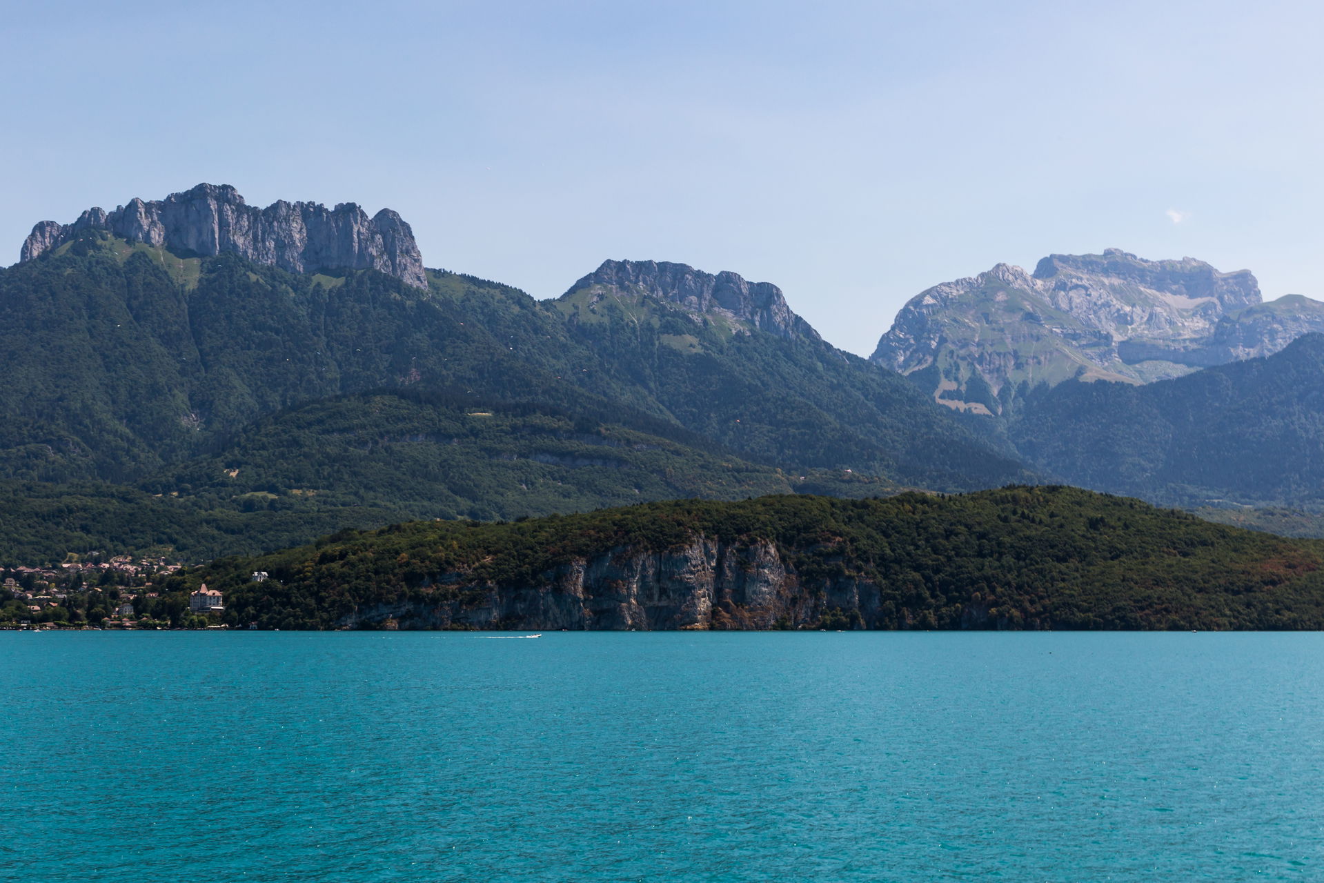 West slope of the Bornes Massif from a boat on Lake Annecy in S…