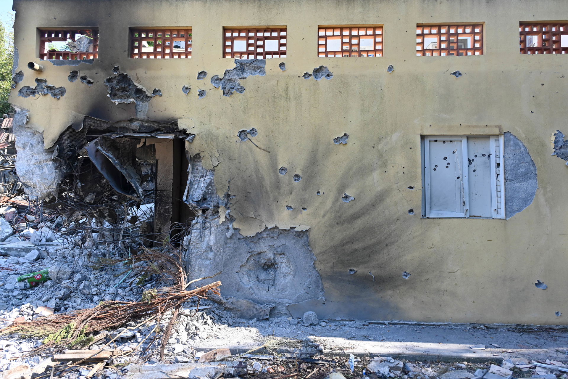 Damaged building in the kibbutz Be'eri in Israel, following the…