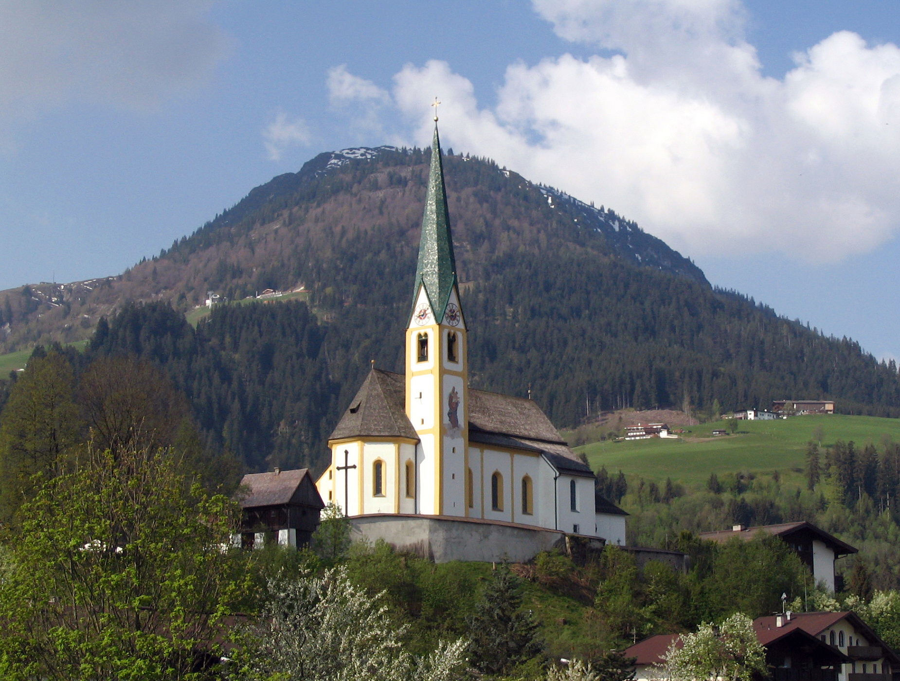 The church in Kirchberg, Tyrol, Austria. In the background the …