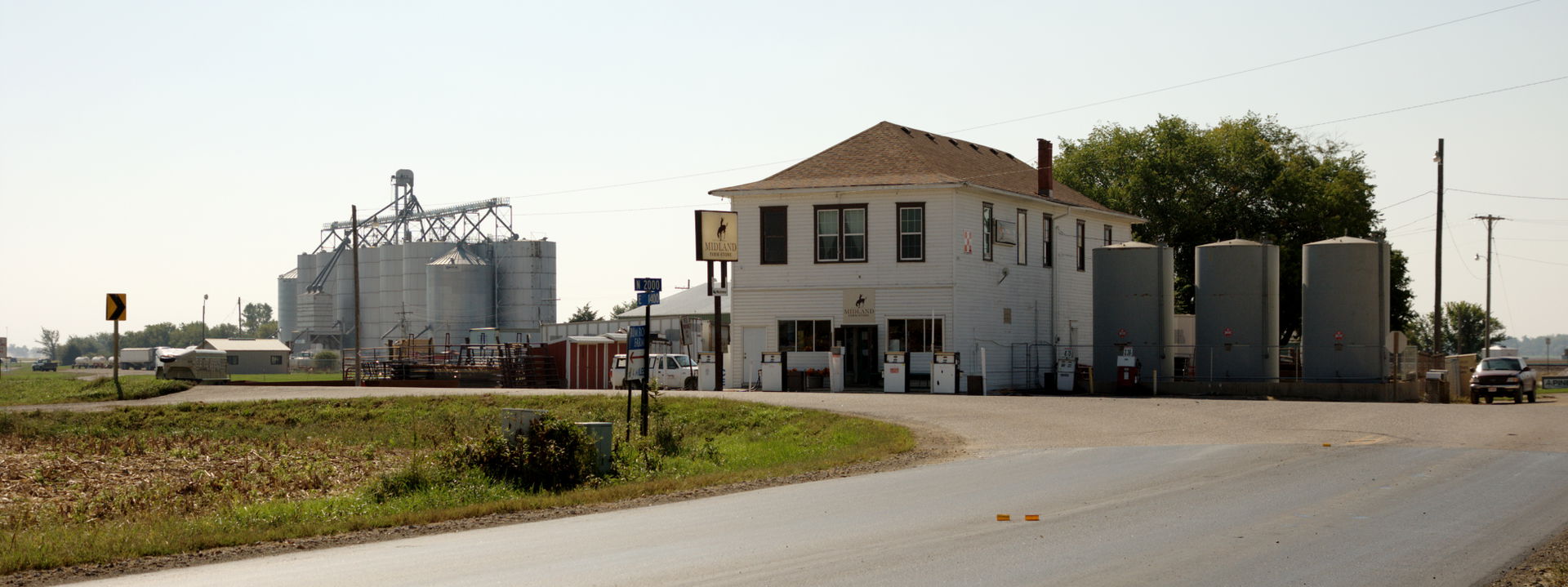 The grain elevator and Midland Farm Store in Midland, Kansas