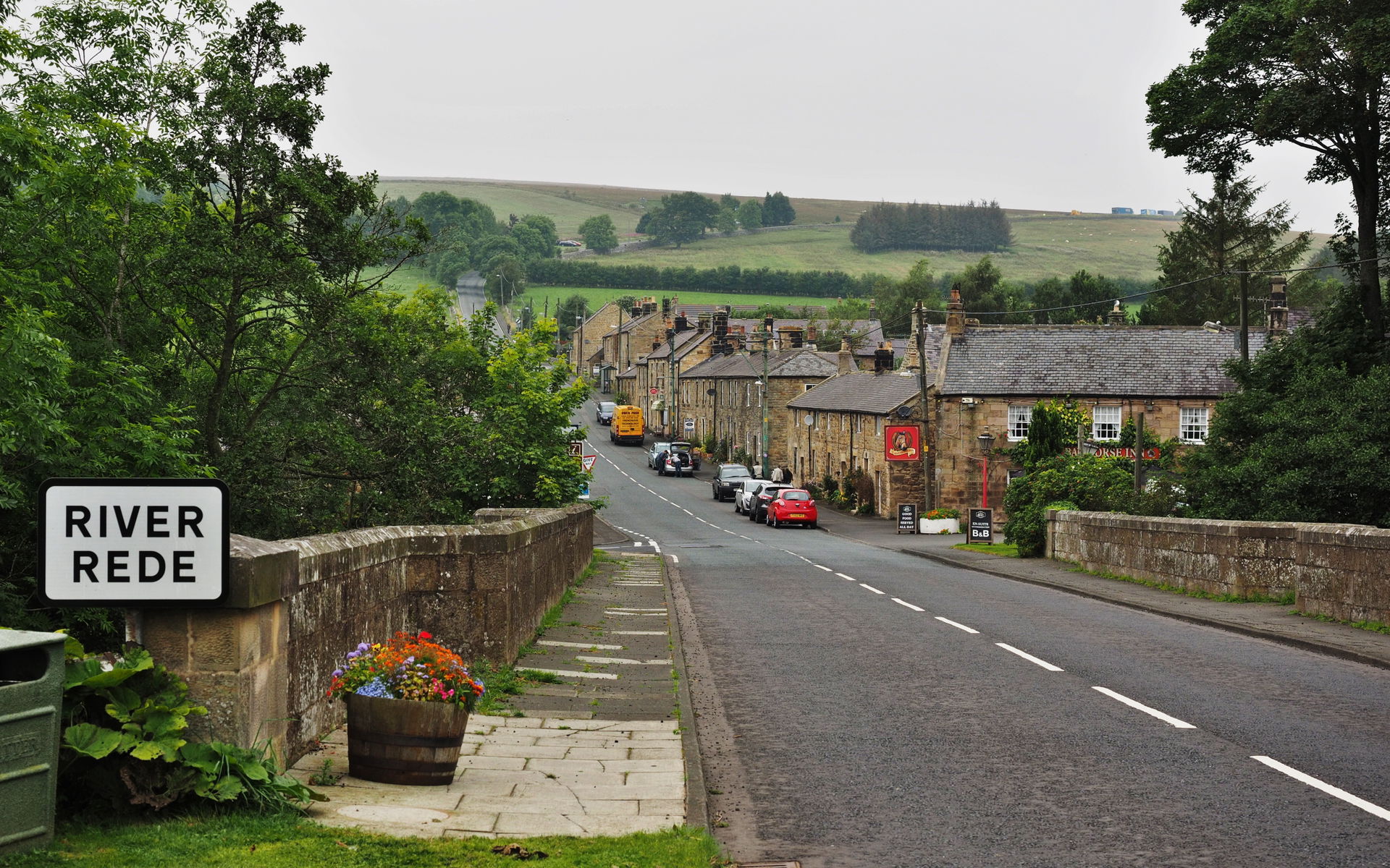 The A68 through West Woodburn, Northumberland, seen from the so…