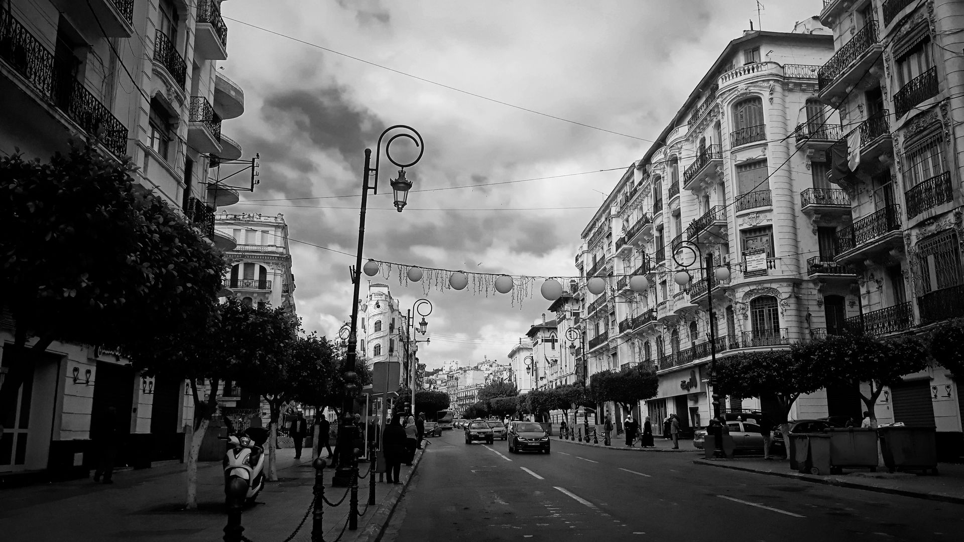 A caption of one of Algiers biggest boulevards, actually called…