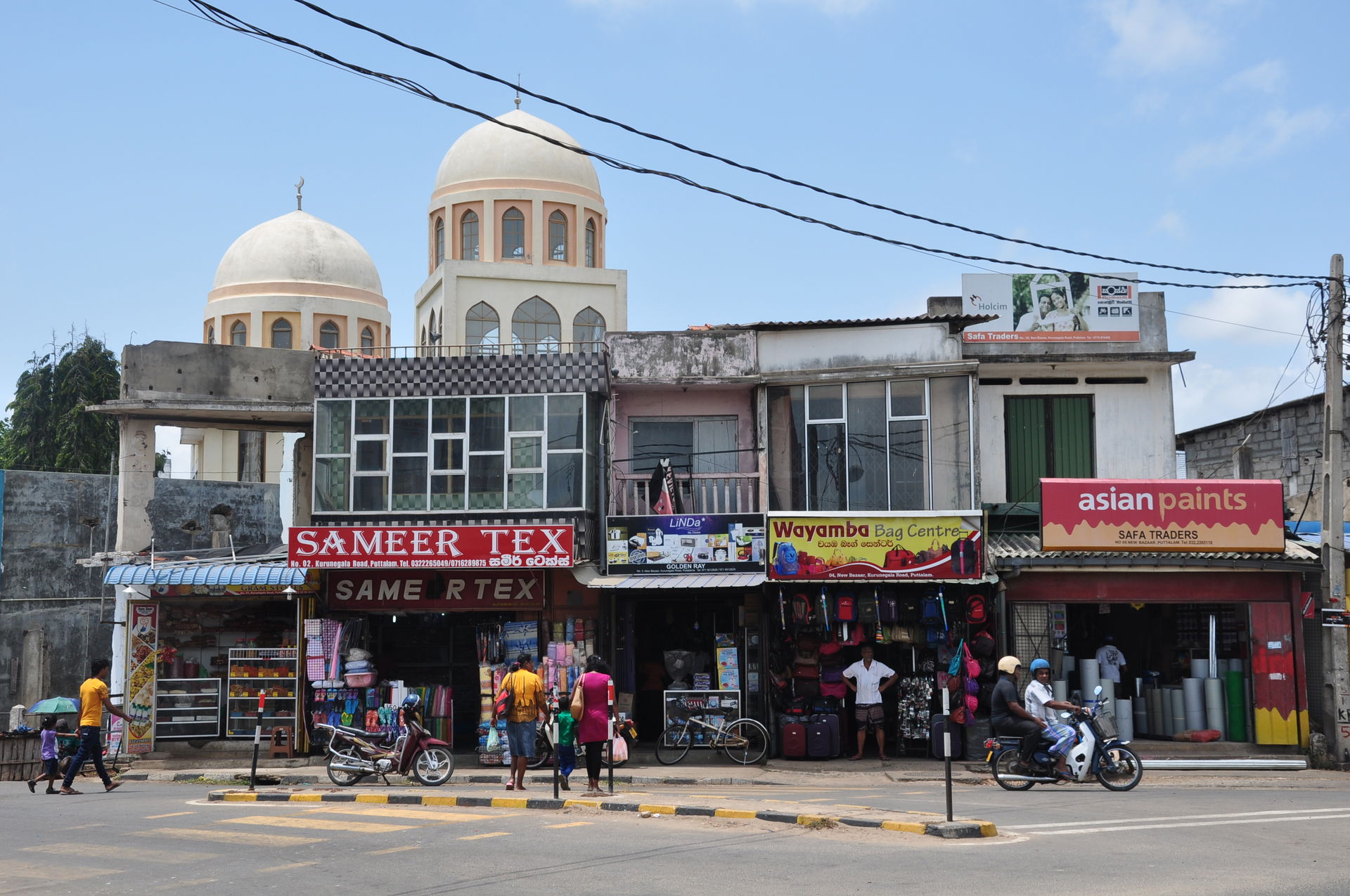 Shops on Kurunegala Street, Puttalam (Sri Lanka). In the backgr…