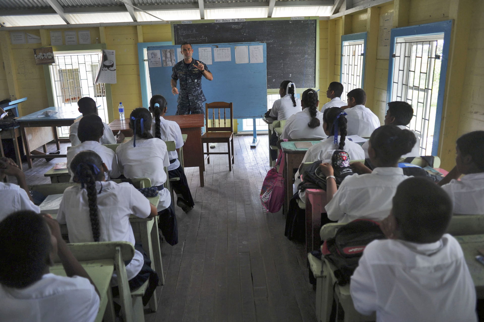 ROSE HALL, Guyana (Oct. 21, 2010) Lt. Mike Kavanaugh speaks to …