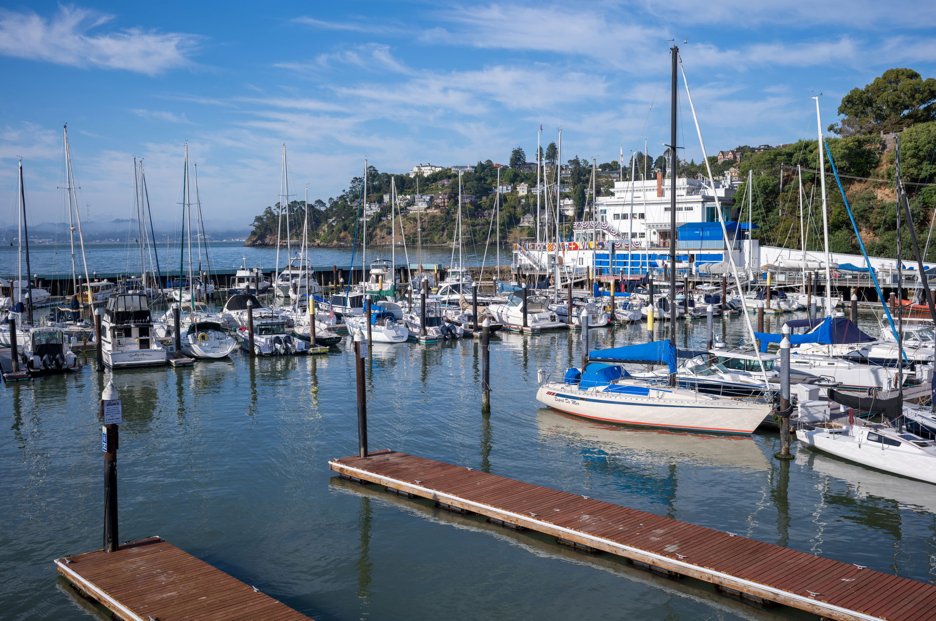 Boats from the Corinthian Yacht Club are moored at their docks …