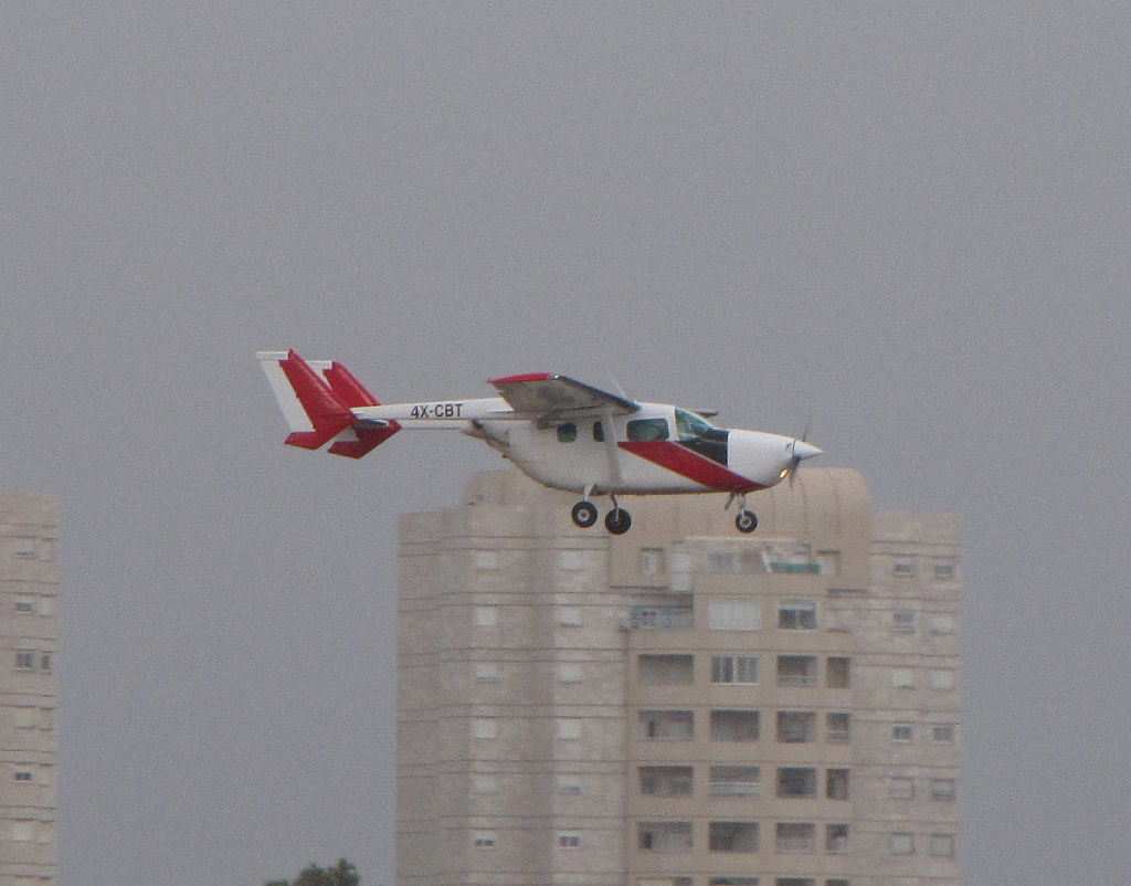Cessna 337G seeding rain clouds