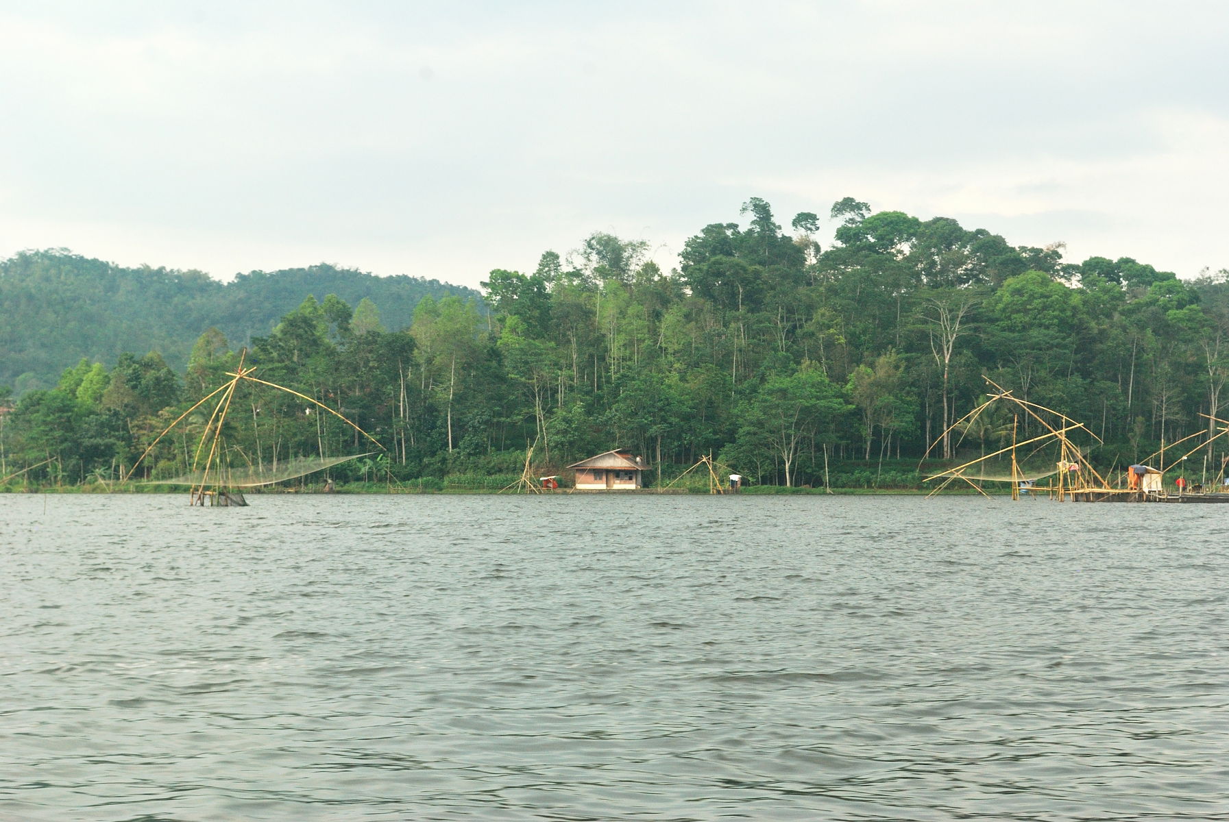 Fishing nets in front of an island on Lake Lengkong in the nort…