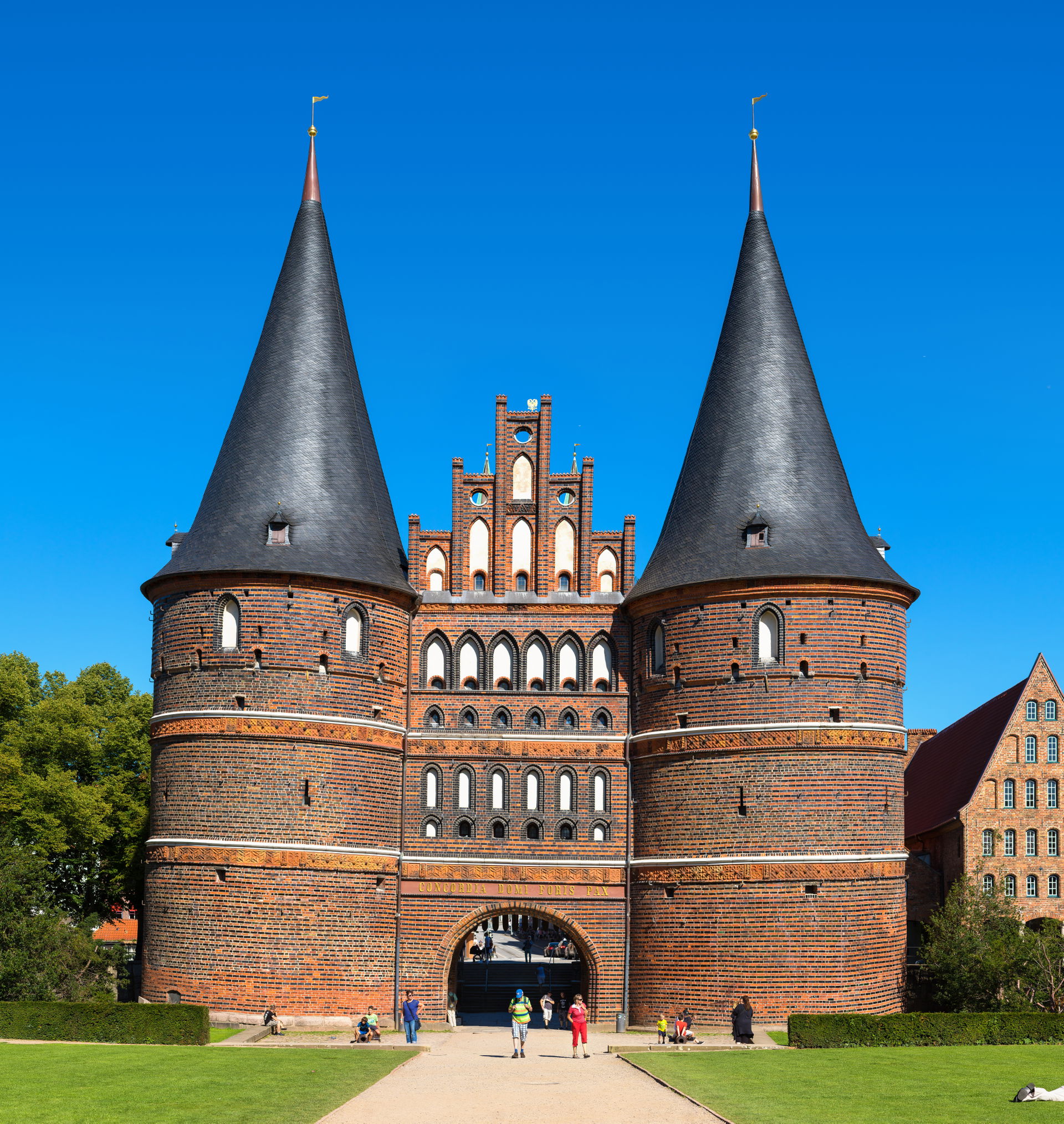 Holstentor in Lübeck, Germany. View from Holstenplatz. Next to …