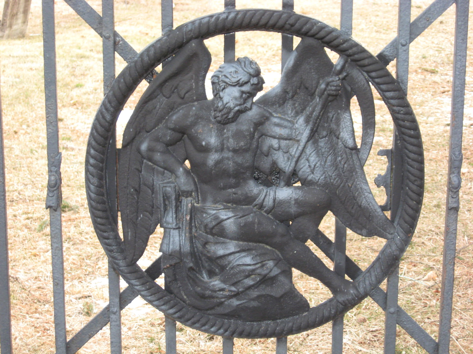 Detail of medallion depicting "Father Time" holding hour glass …