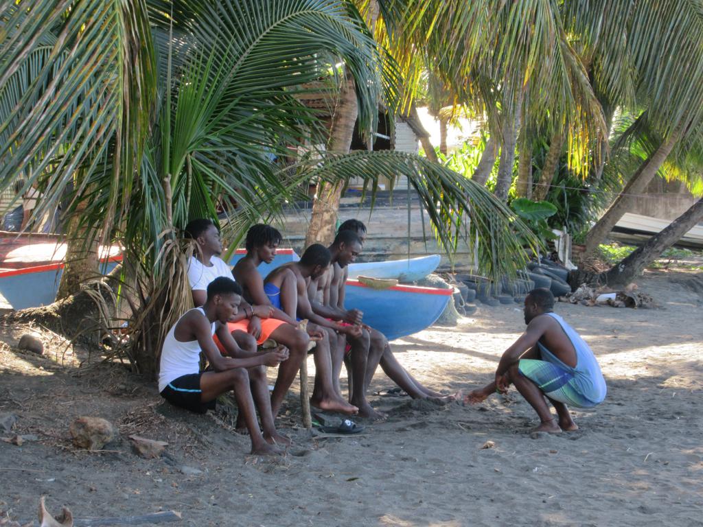 These locals are relaxing on Chateaubelair Beach on the norther…