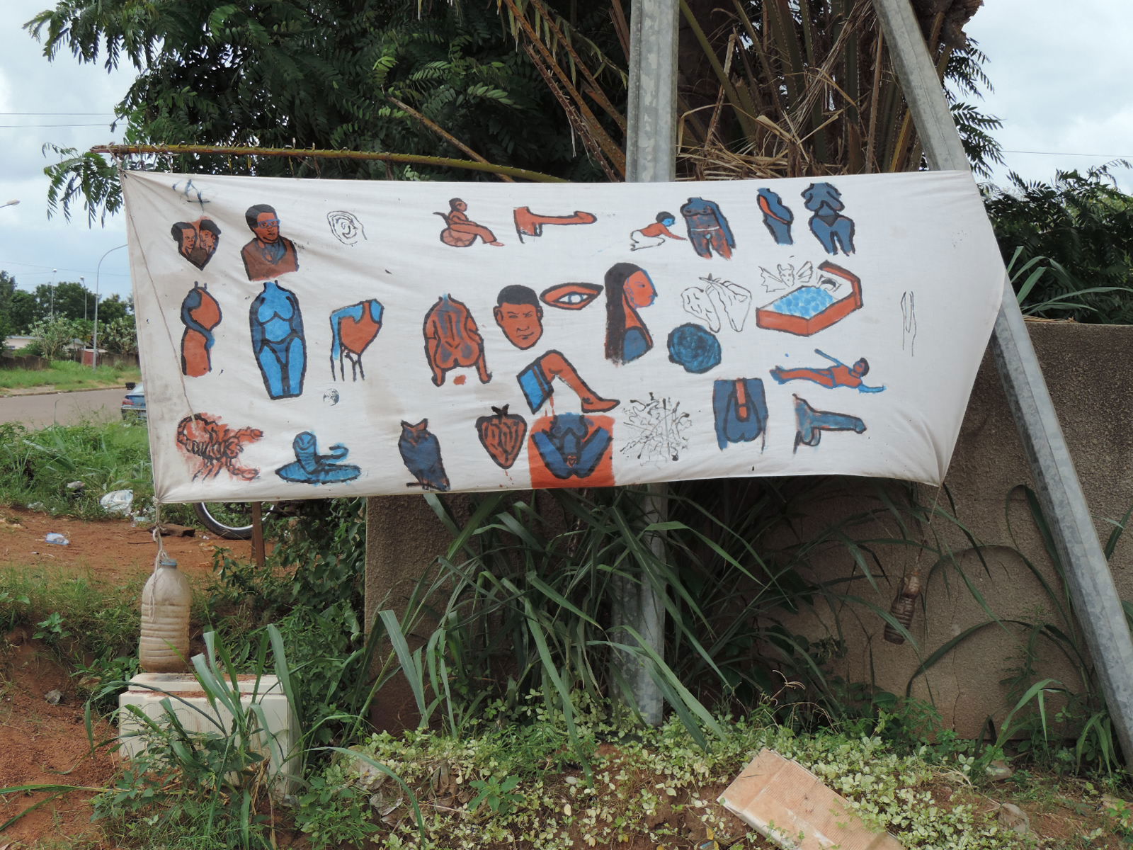 Publicité d'un guérisseur (Yamoussoukro, Côte d'Ivoire, 2014)