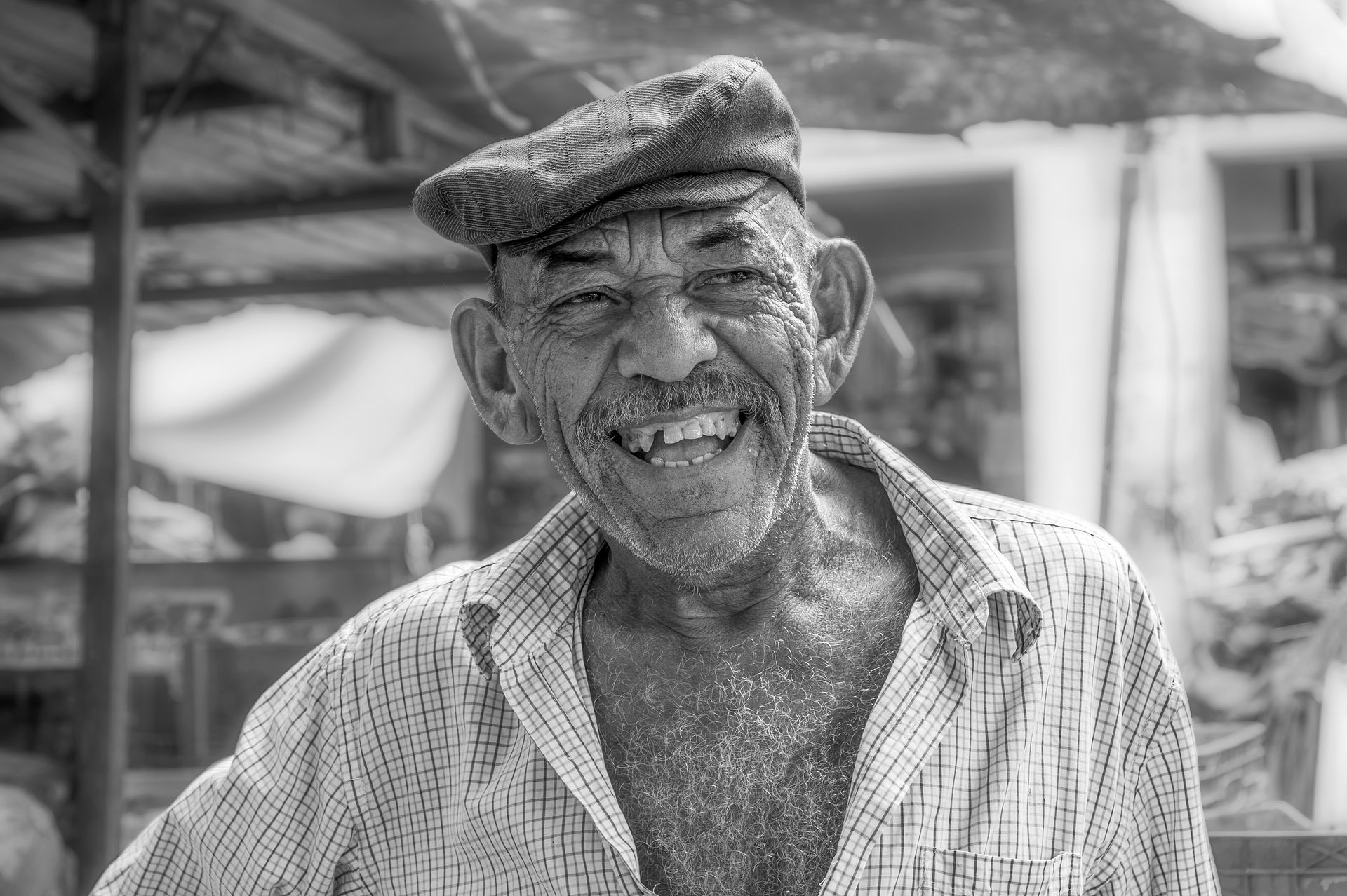 Fishmonger smiling, Maracaibo street market, Venezuela