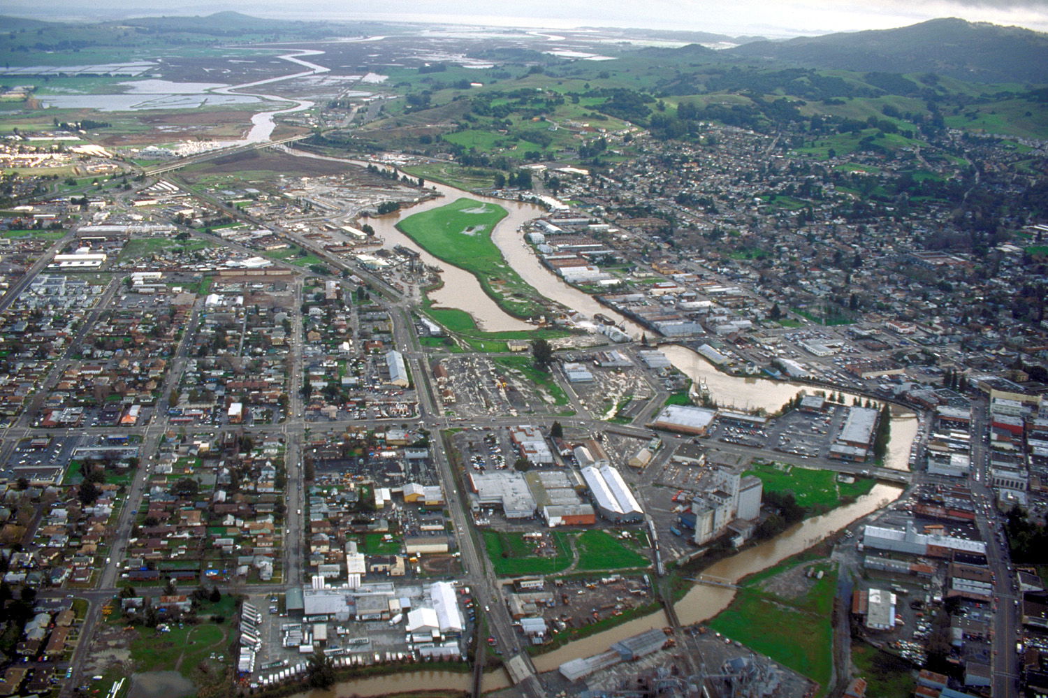 Aerial view of Petaluma, California, USA. The Petaluma River fl…