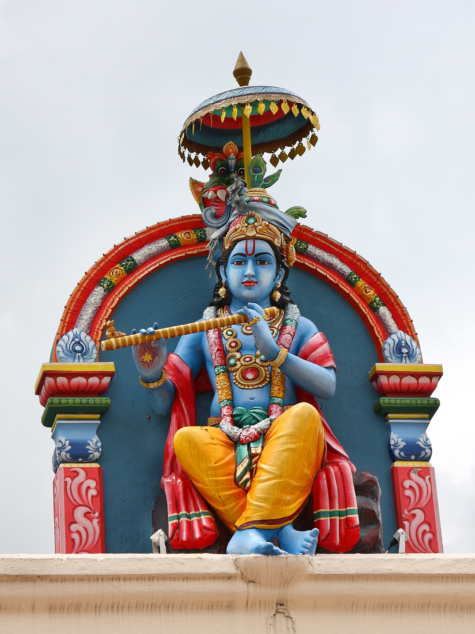 Krishna's statue at the Sri Mariamman Temple, Singapore.