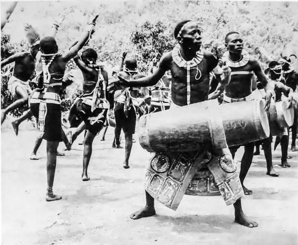 A troupe of Kamba dancers engage in a dance in 1956. The Kamba …