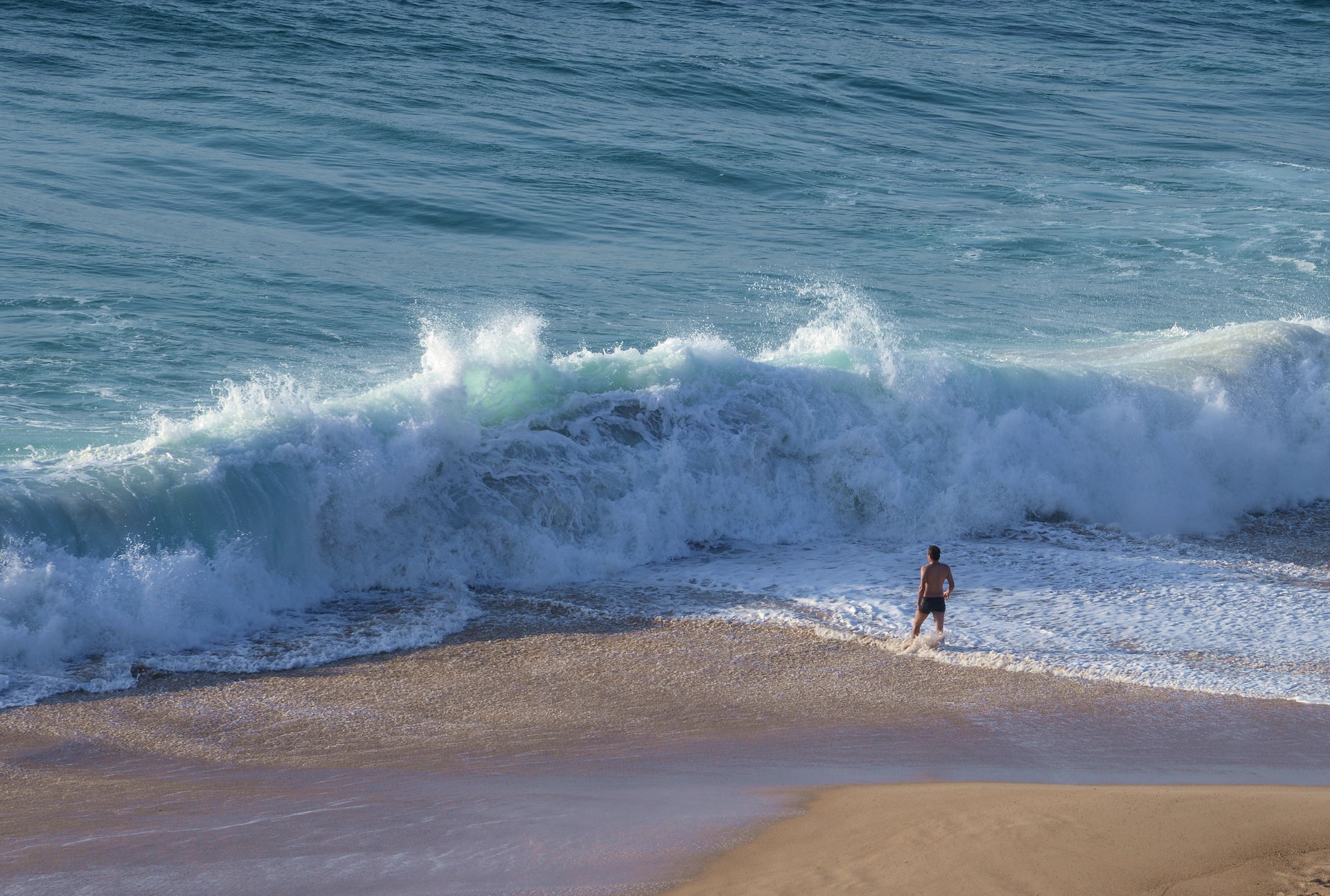 Breaking wave in Porto Covo, Portugal