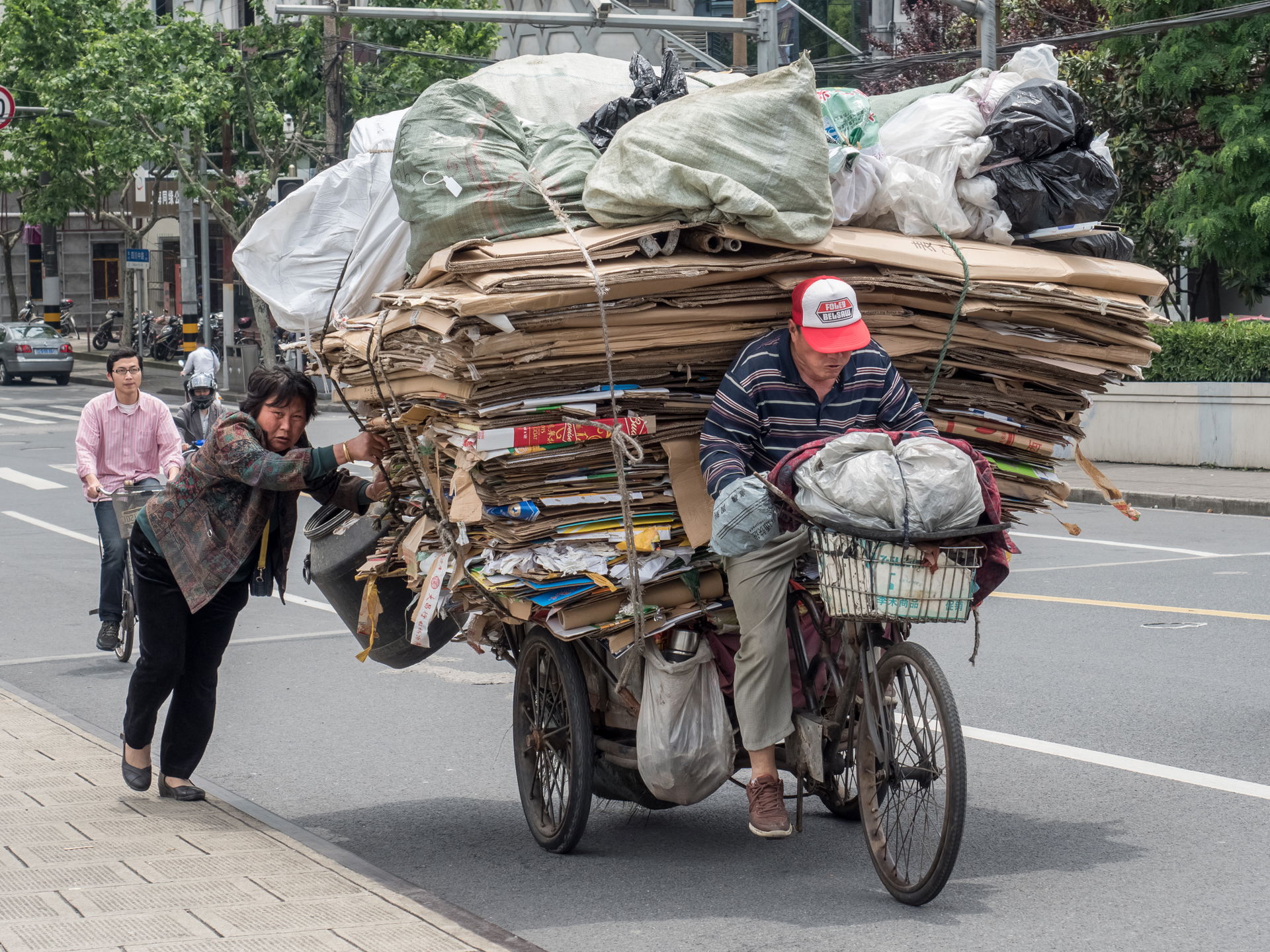 Transport of recycled material on a freight bicycle in Shanghai.